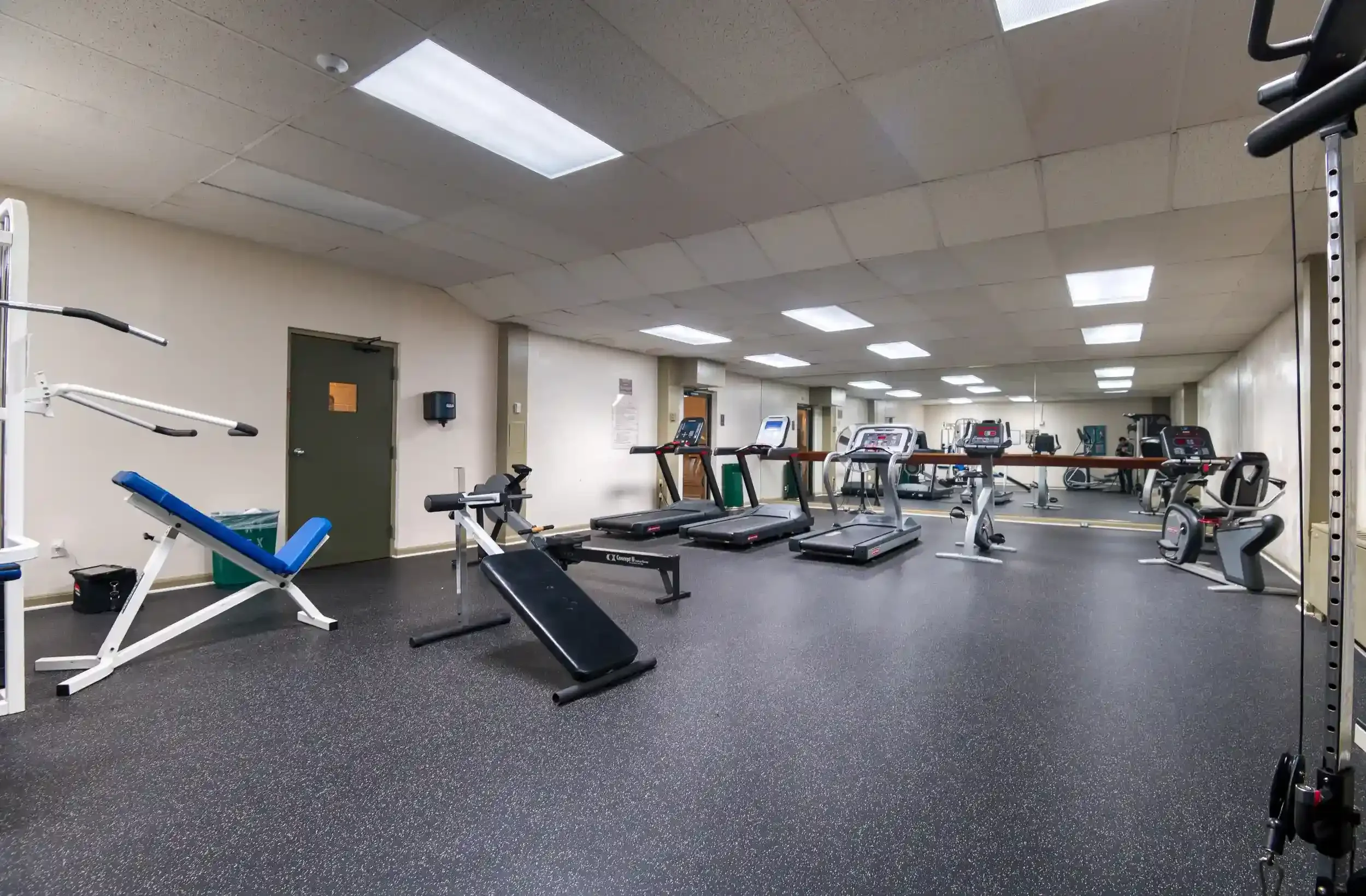 Fitness Room (View 1) – The Arlington features a fitness room with both cardio and strength equipment for convenient workouts at home.
