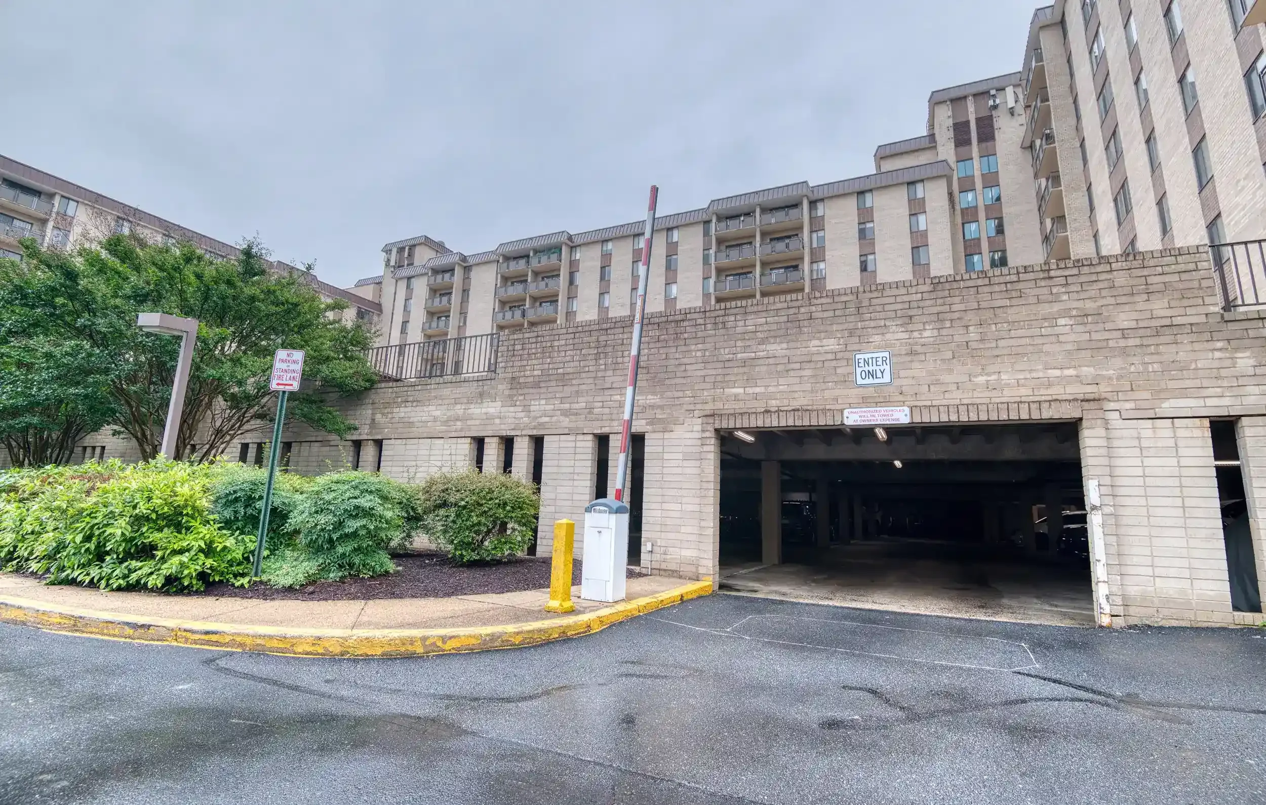 Garage Entrance – Covered garage parking at The Manchester protects residents’ vehicles from weather year-round.