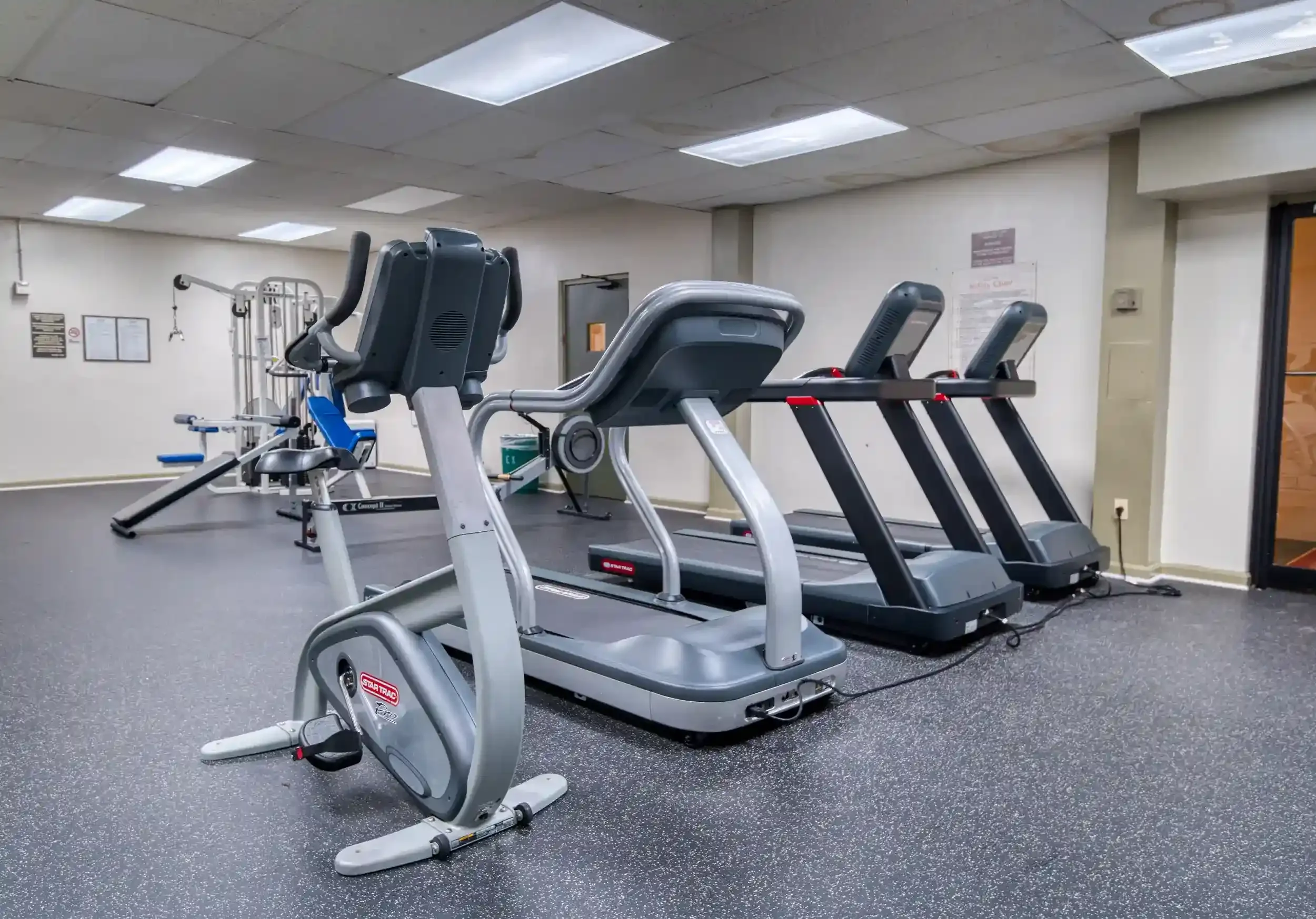 Fitness Room (View 2) – Treadmills, ellipticals, and other machines help residents maintain their fitness routine without leaving the building.