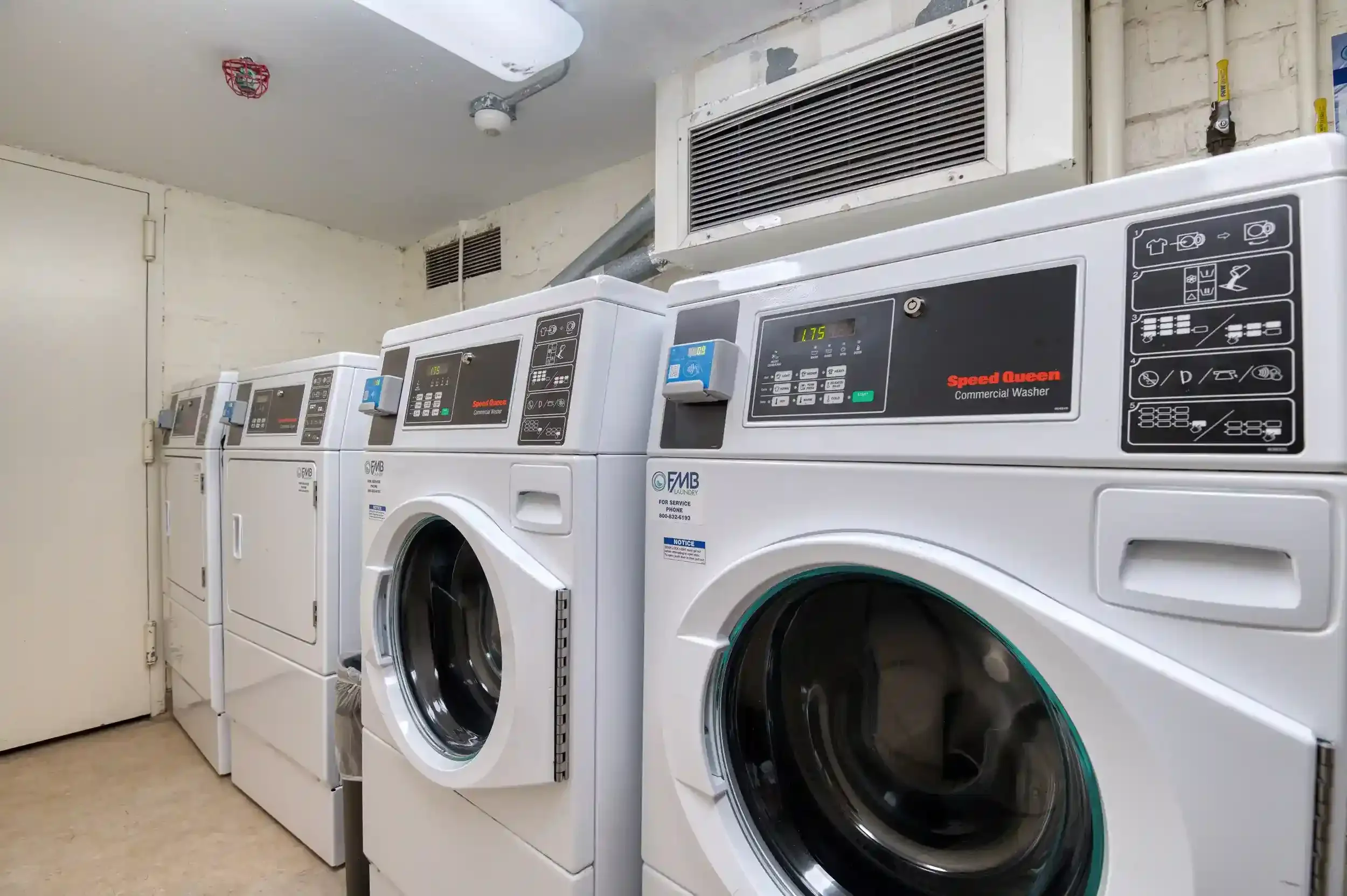 Laundry Room – The Carlyn’s laundry room has commercial machines, making laundry day simple and accessible.