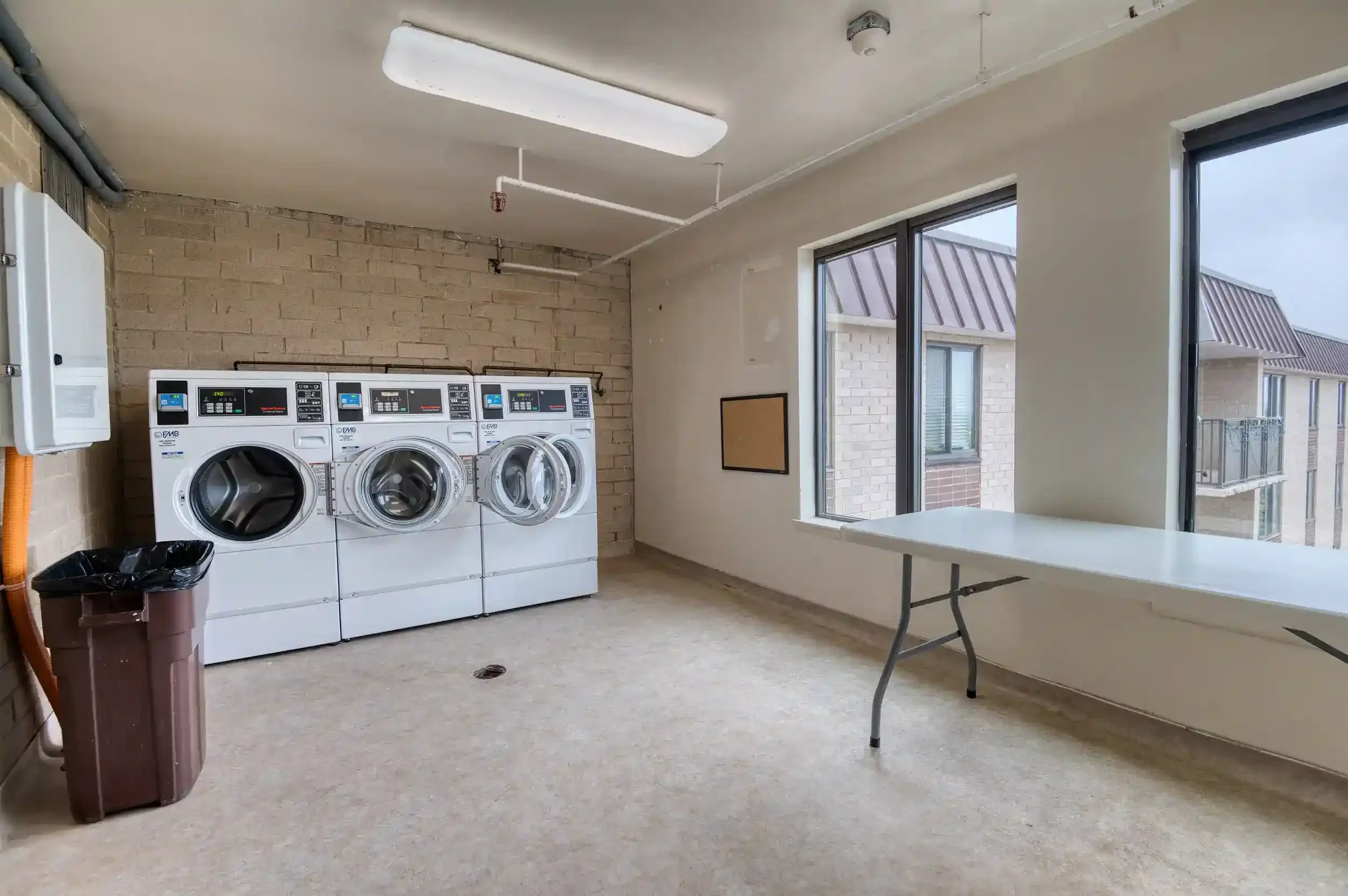 Laundry Room (View 1) – The Manchester offers two laundry rooms per floor for convenient access. 
