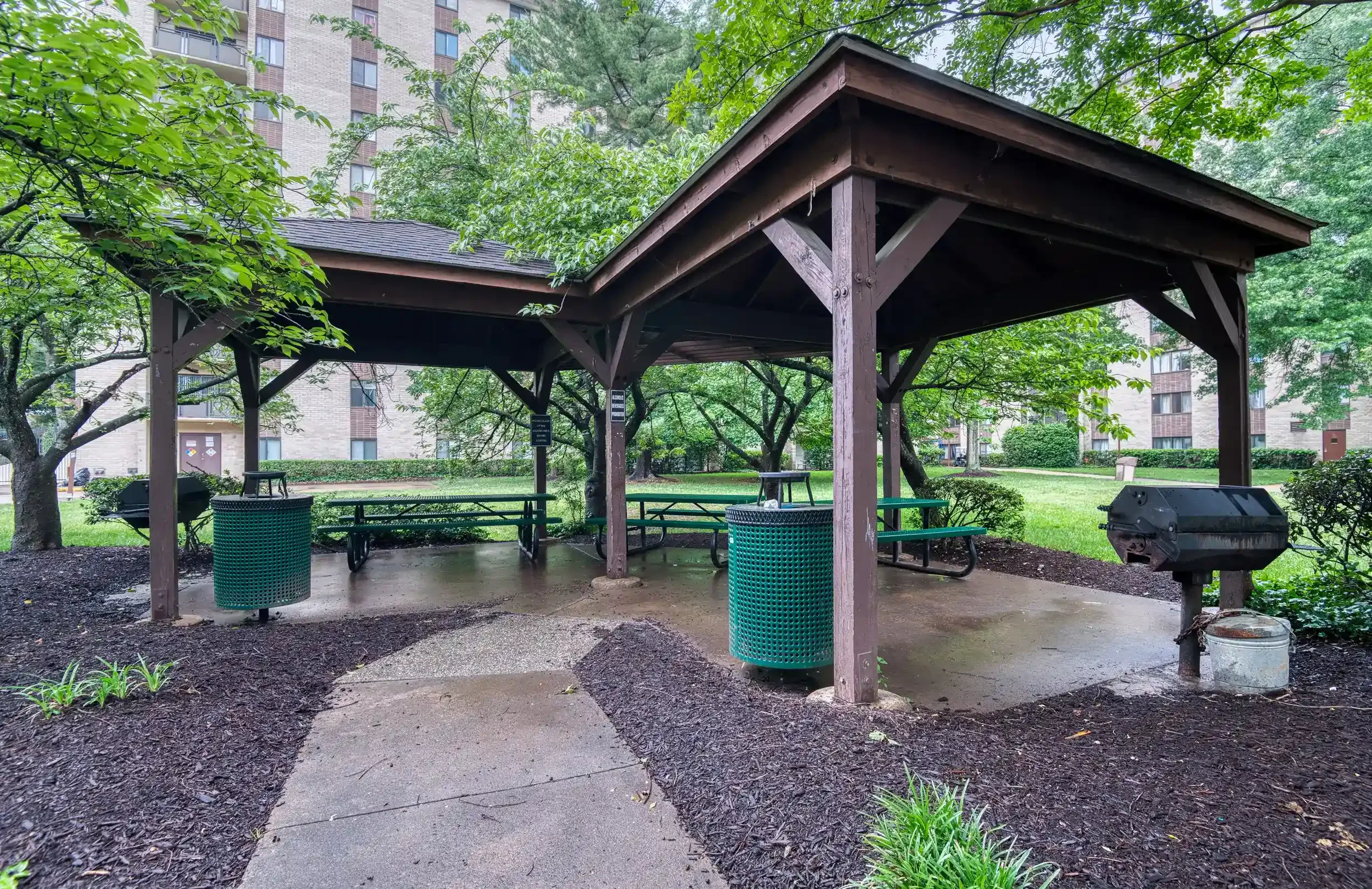 Gazebo with Barbecue – A shared gazebo and grill area provides a shaded space for outdoor meals and gatherings.