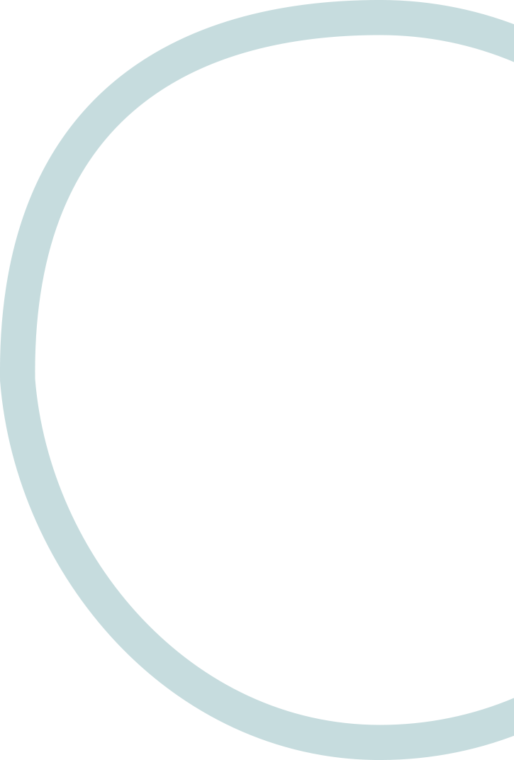 A partial image of a thick, teal-colored circular ring or border on a black background.