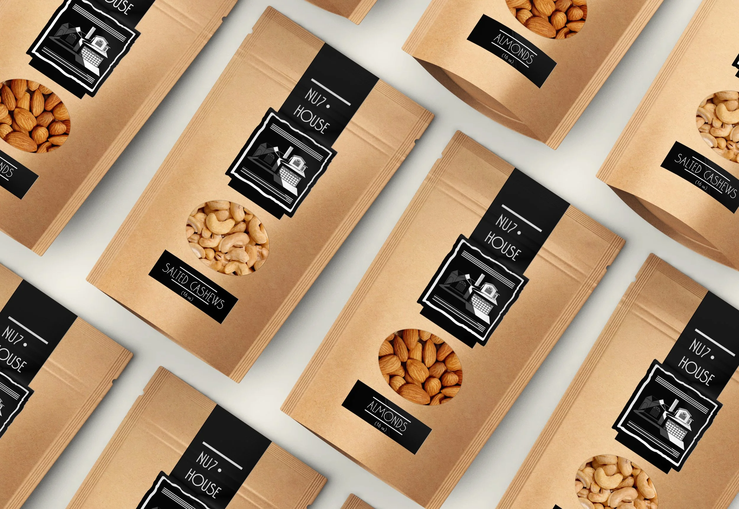 Multiple brown paper bags of salted cashews and almonds, with circular windows showing the nuts inside, arranged in a repeating pattern.