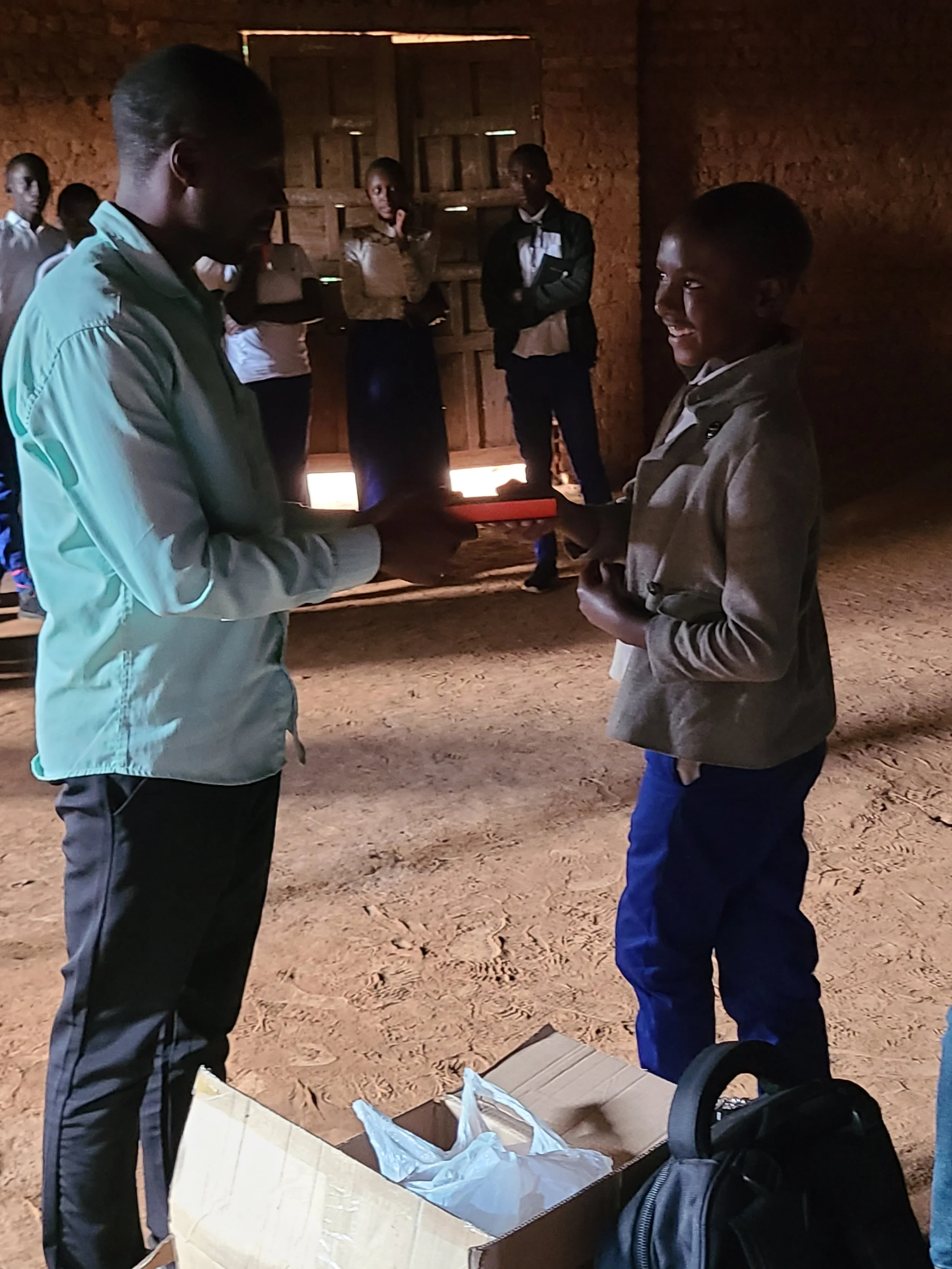 04 PHOTO Student Bible Distribution.jpg