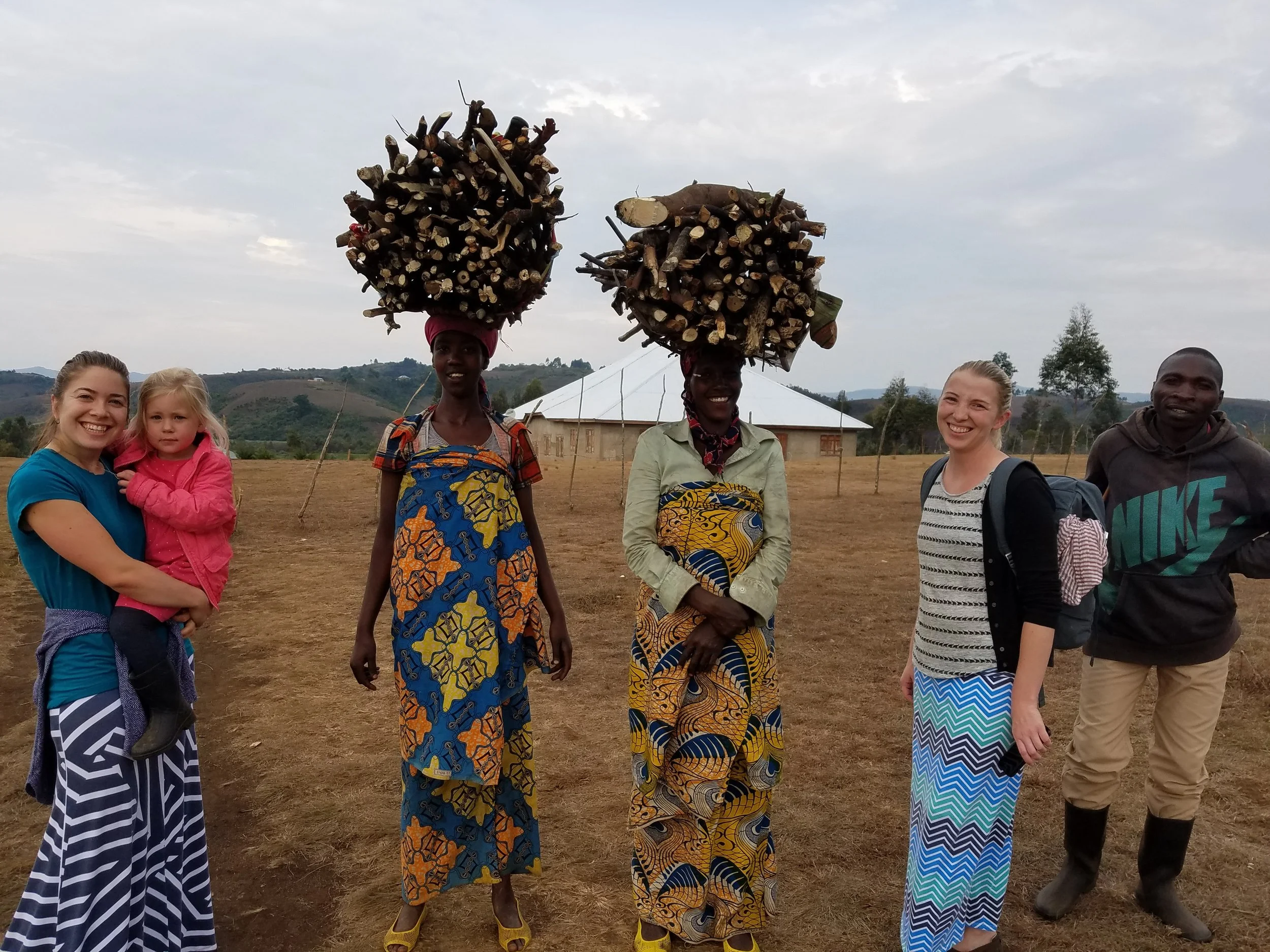 Walking 4 - Chatting with our neighbors, who cut and carry wood for income. I always try to keep the conversation short when I’m chatting women who have heavy loads on their heads..jpg