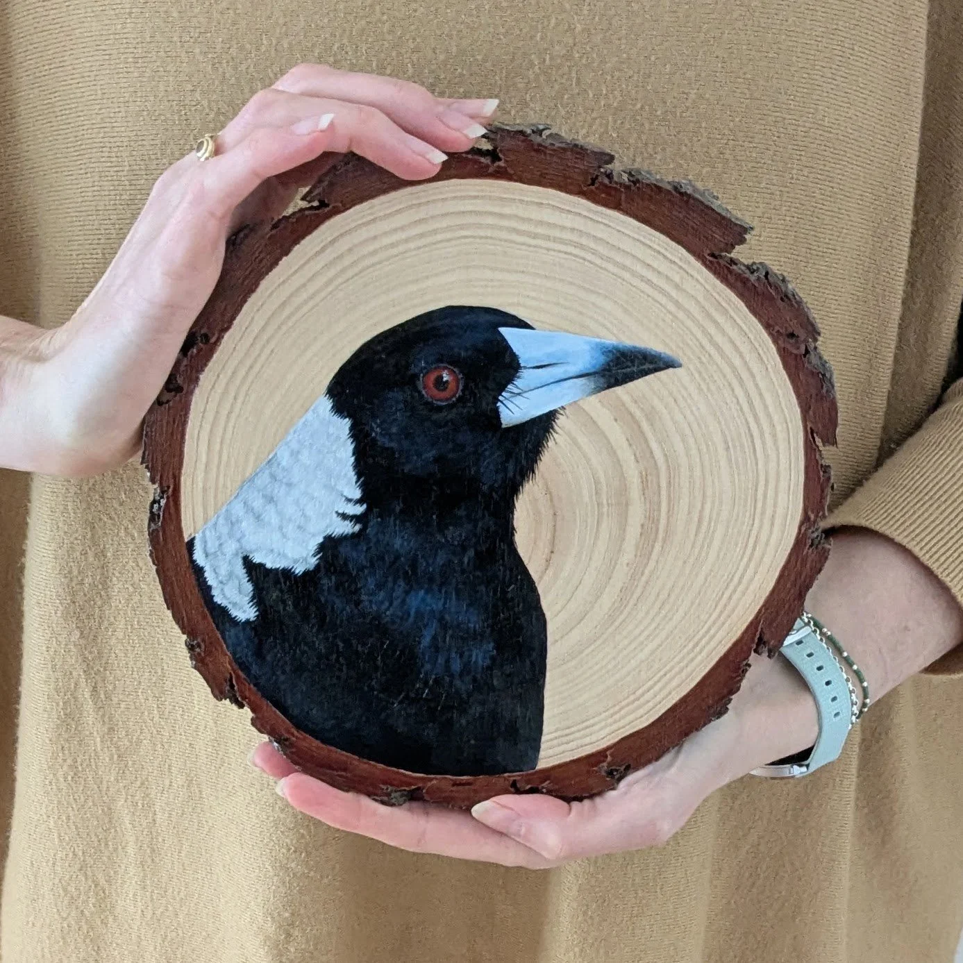 magpieonwoodinhands.jpg