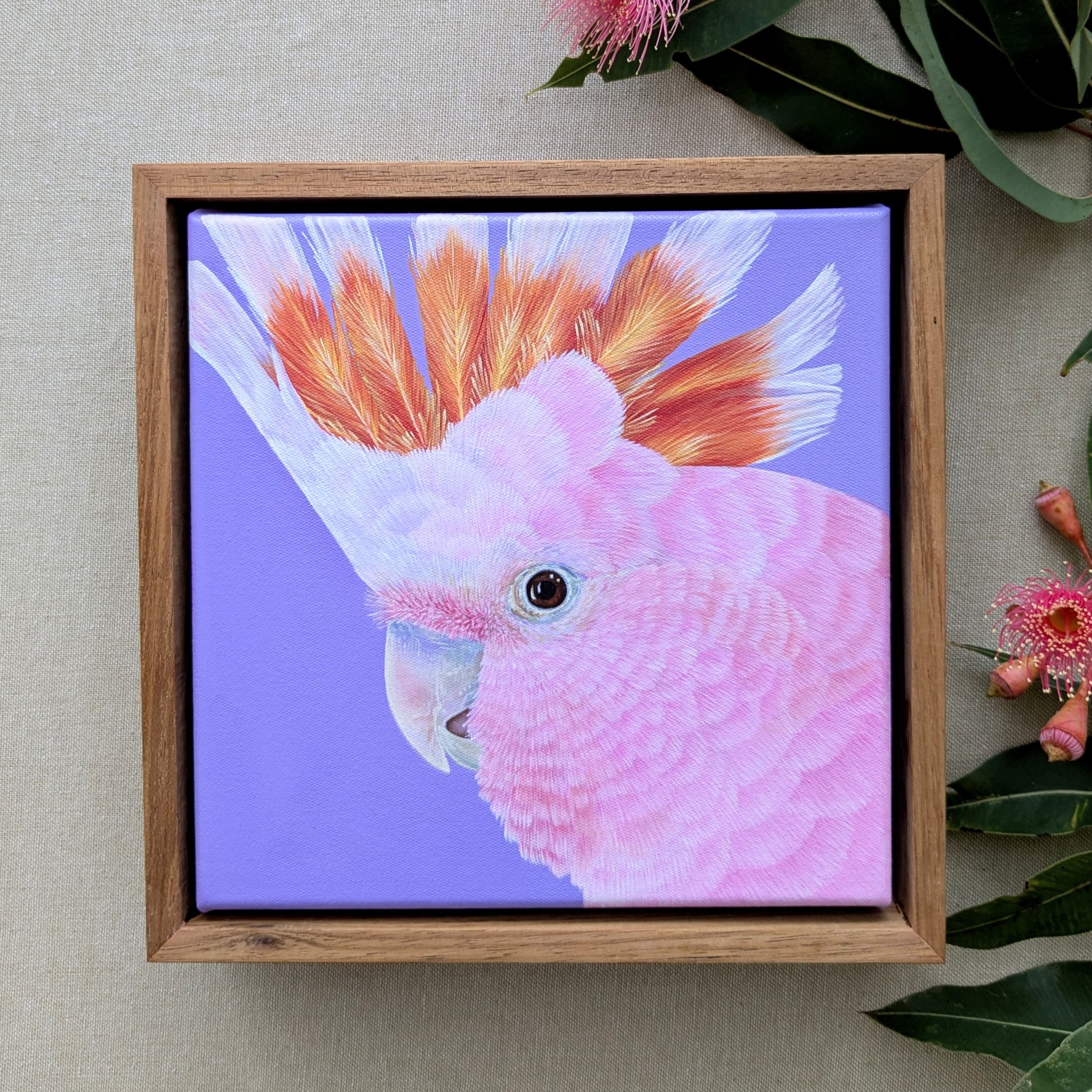 pinkcockatoopaintingwithflowerssquarecrop.jpg
