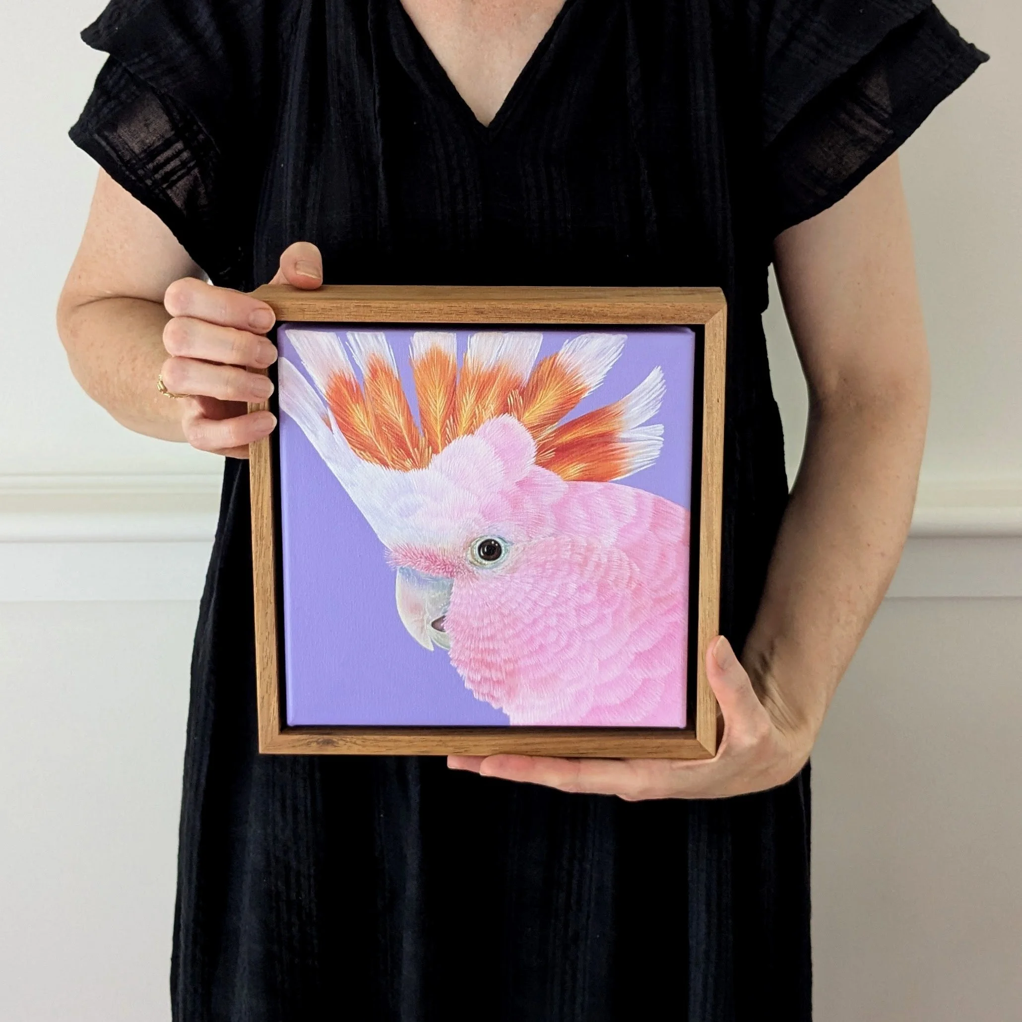 pinkcockatoopaintinginhands.jpg