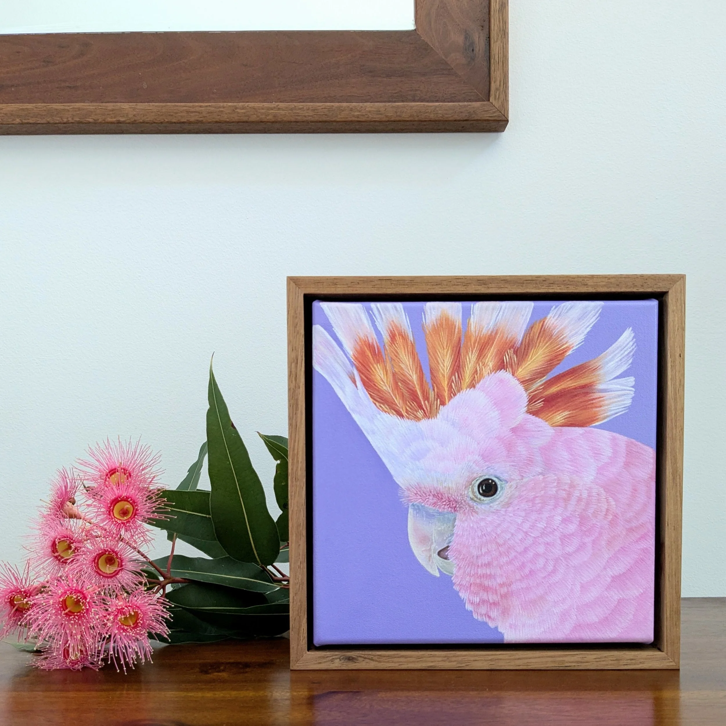 pinkcockatoopaintingontable.jpg