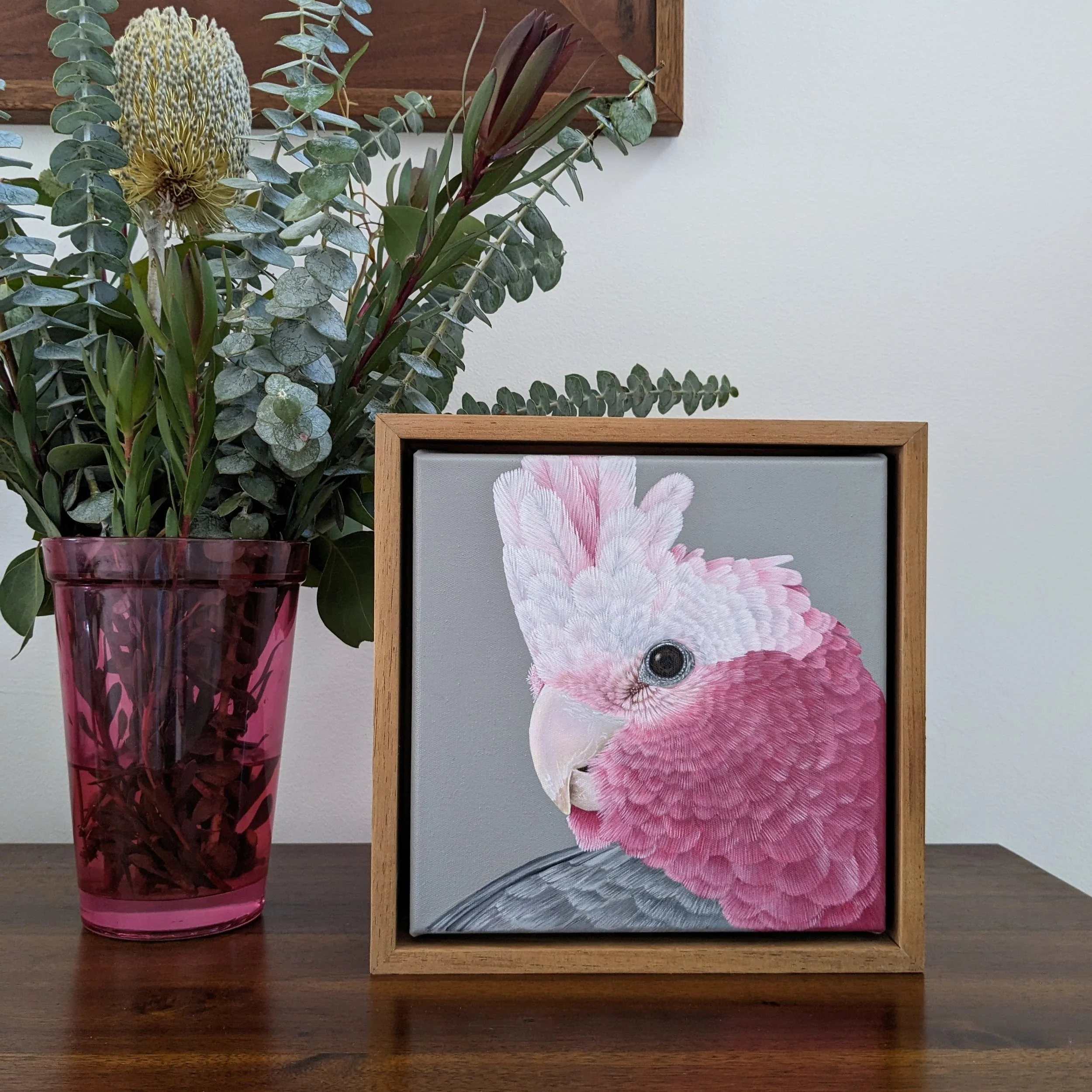 galahpaintingonshelfwithpinkvase.jpg