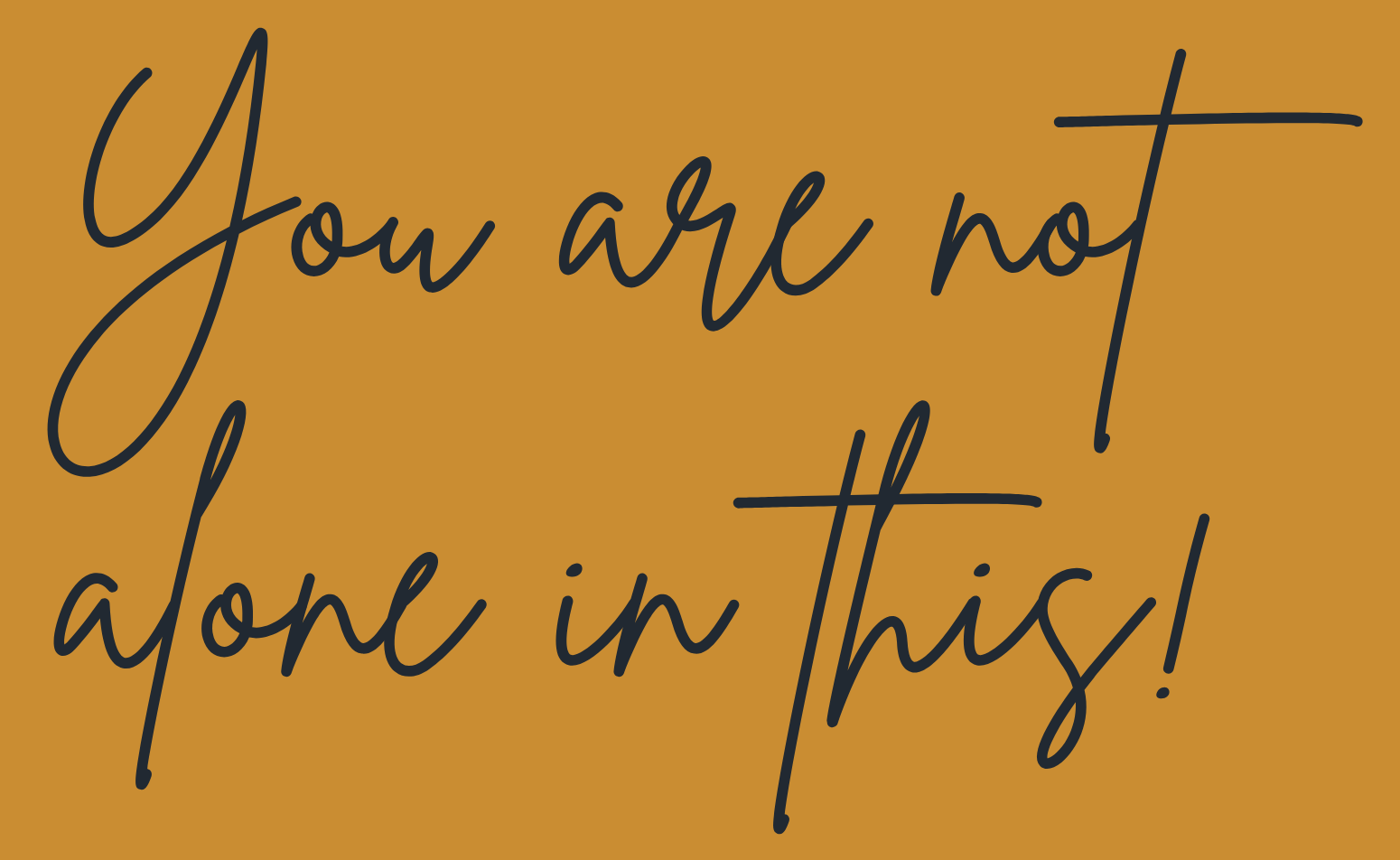 Handwritten text on a mustard yellow background that reads: "You are not alone in this!"