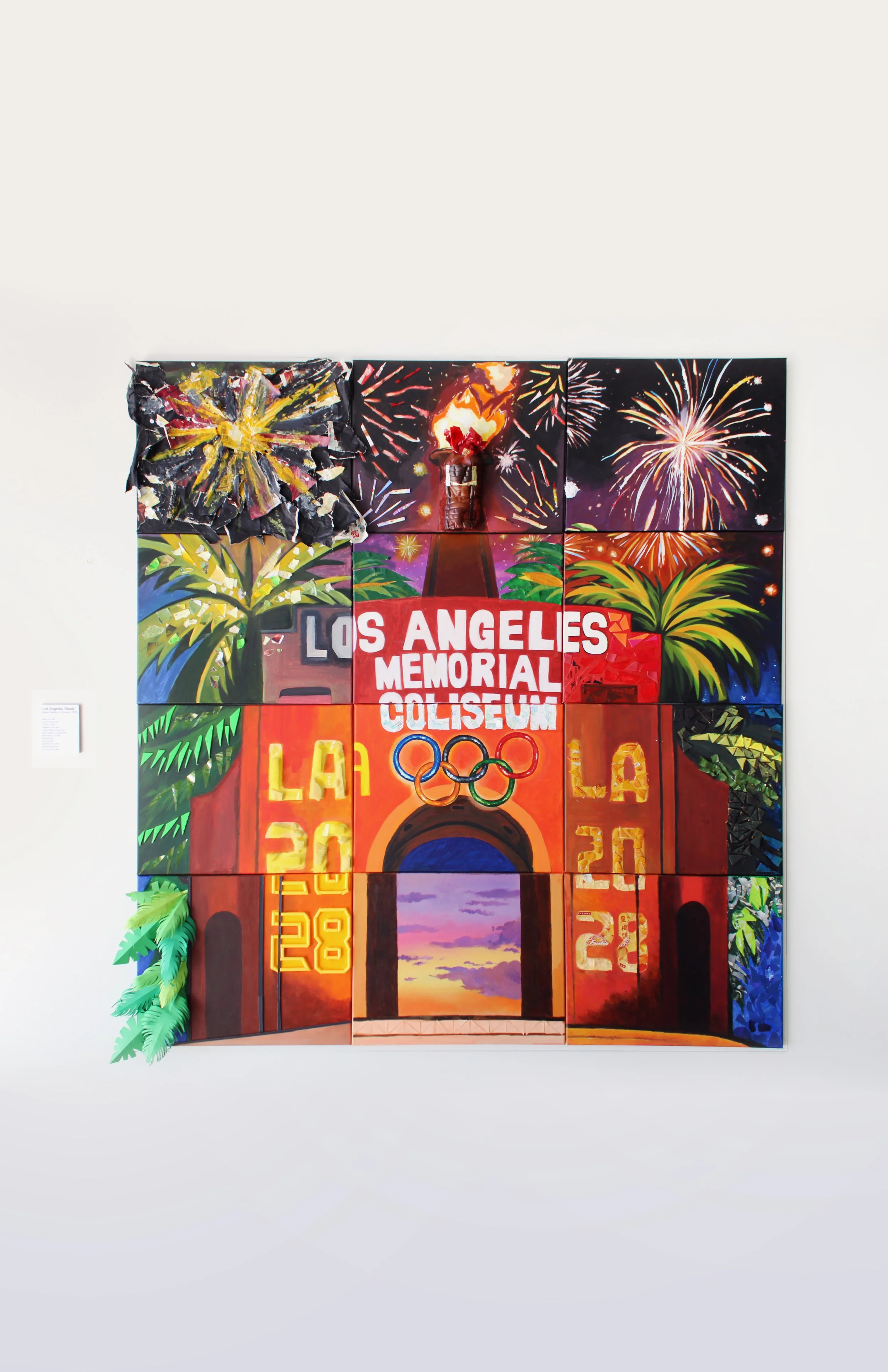 A colorful mural depicting fireworks, palm trees, and the Los Angeles Memorial Coliseum with the Olympics rings, celebrating Los Angeles 2028 Olympics.