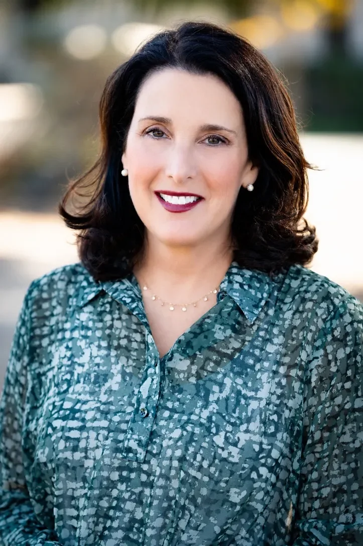 Concierge doctor Bonnie Rosenberg, M.D. in Bay Area, wearing a blue and teal blouse