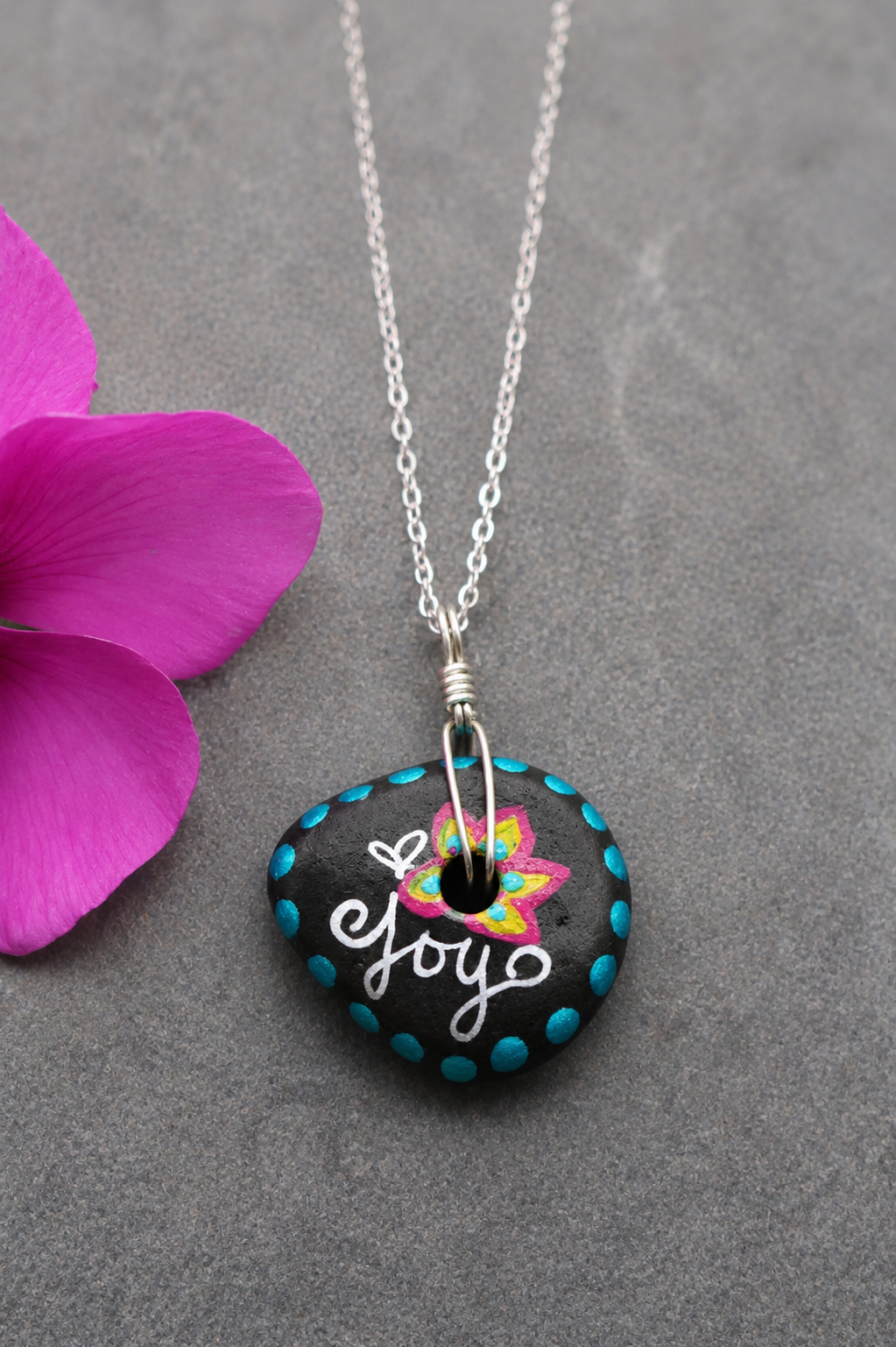 Joy Rock Story Necklace, a hand-painted rock pendant product photo