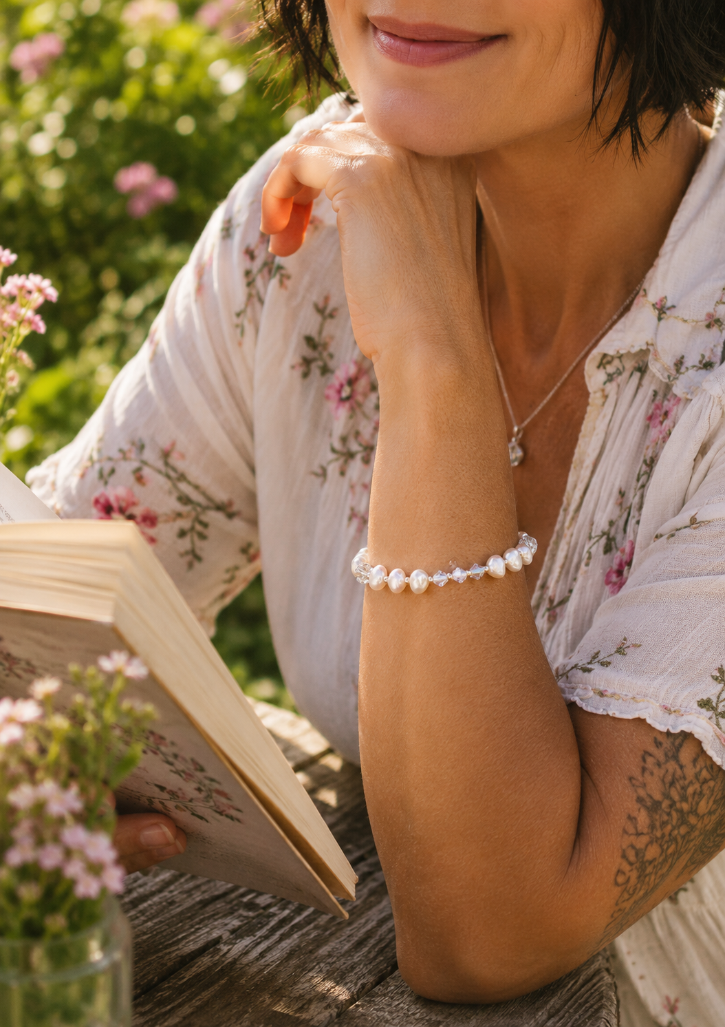 crystal pearl bracelt in the garden.png