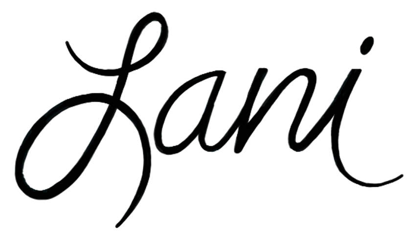Neon sign spelling out the word 'Love' in cursive script.