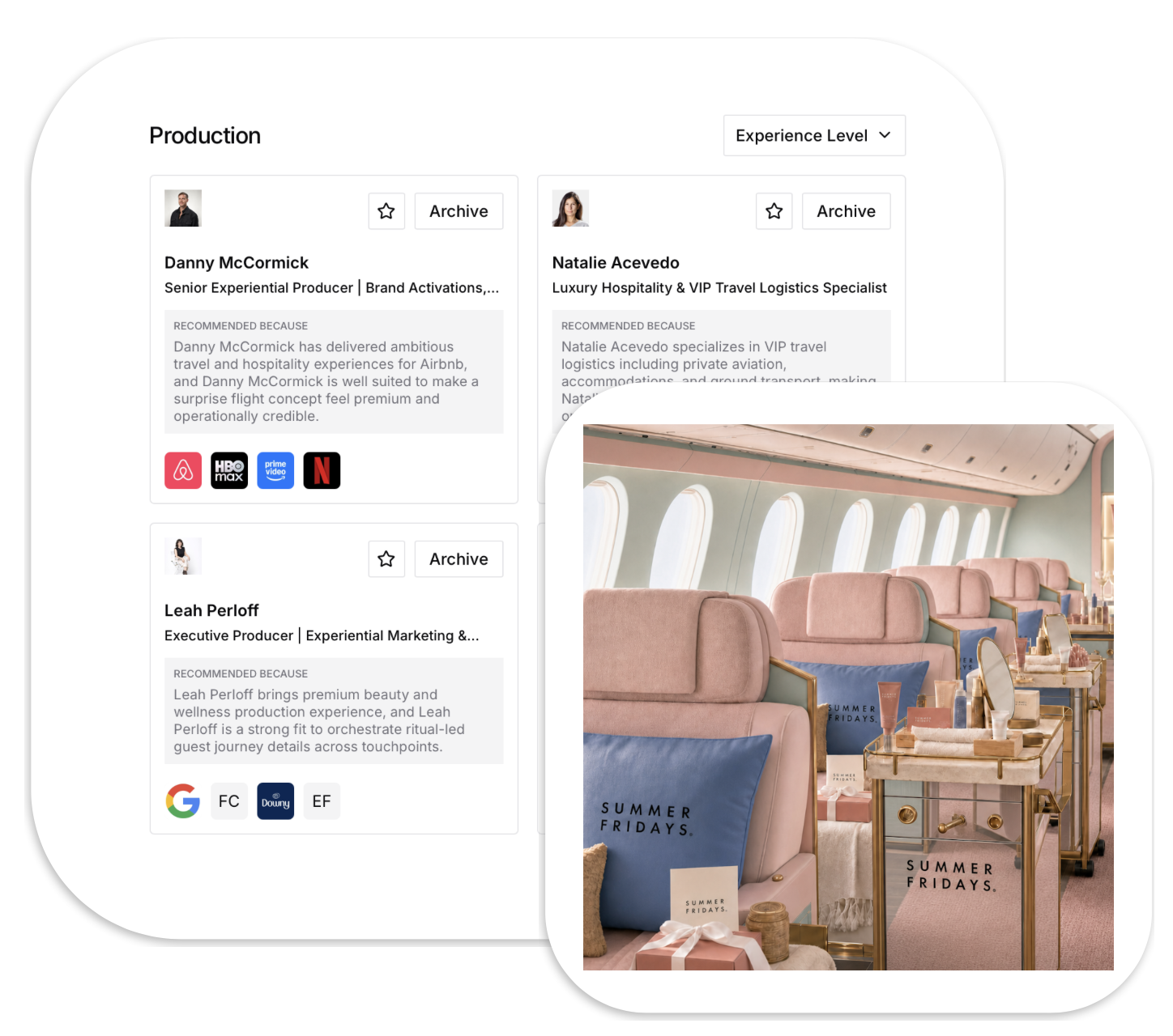 Interior of an airplane with pink and blue seats, large windows, and decorative elements reading 'Summer Fridays'.