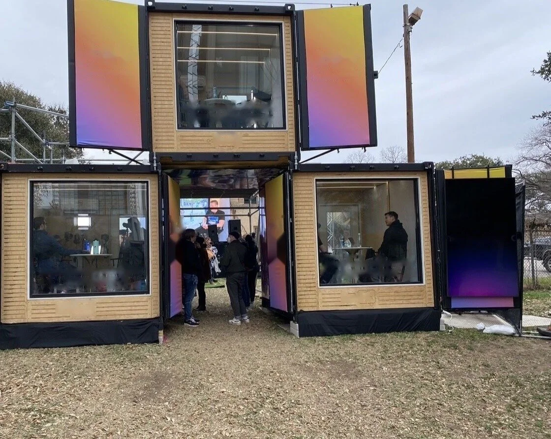 Brand activation at SXSW: stacked shipping container studios with live content rooms, Austin, Texas