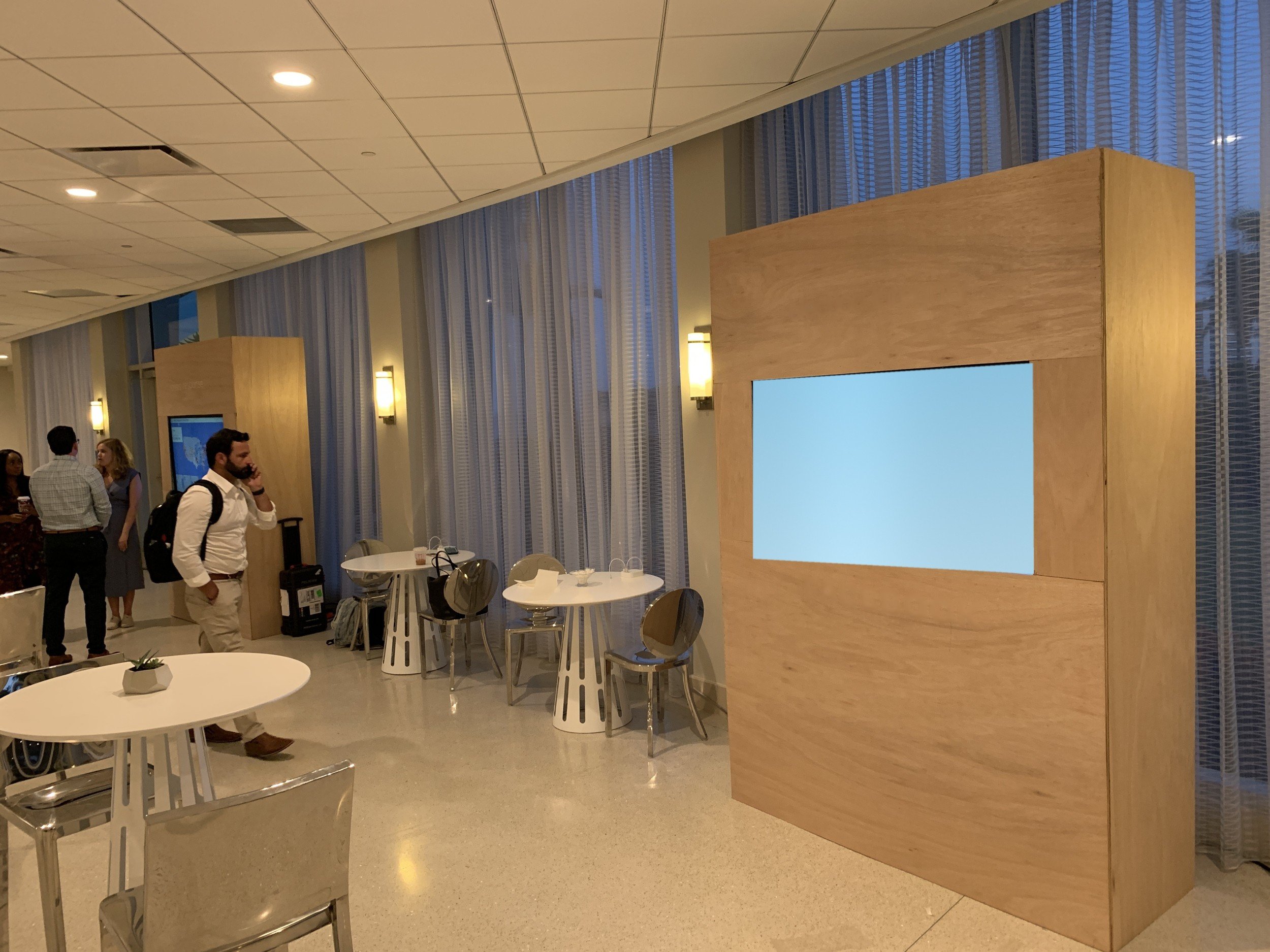 Custom build: wood kiosks with touch screens in a lounge setting, Puerto Rico