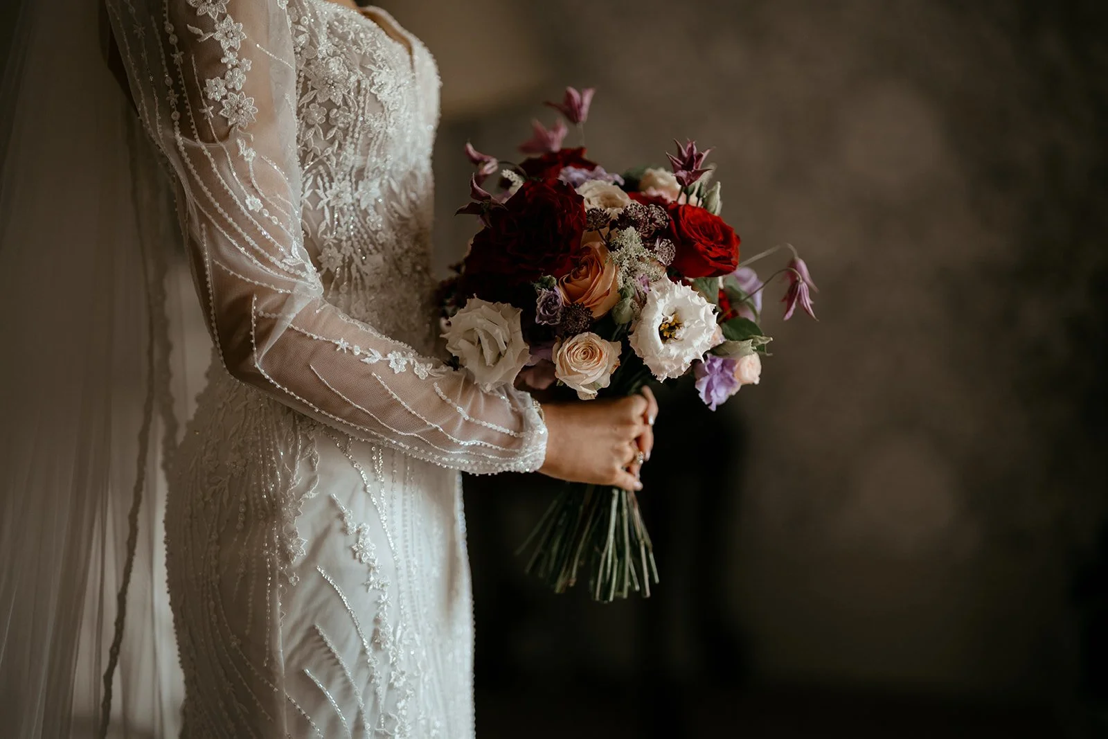Moody red with accents of Lilac and Pale Pink | Image credit: Lauren Stacey Photography