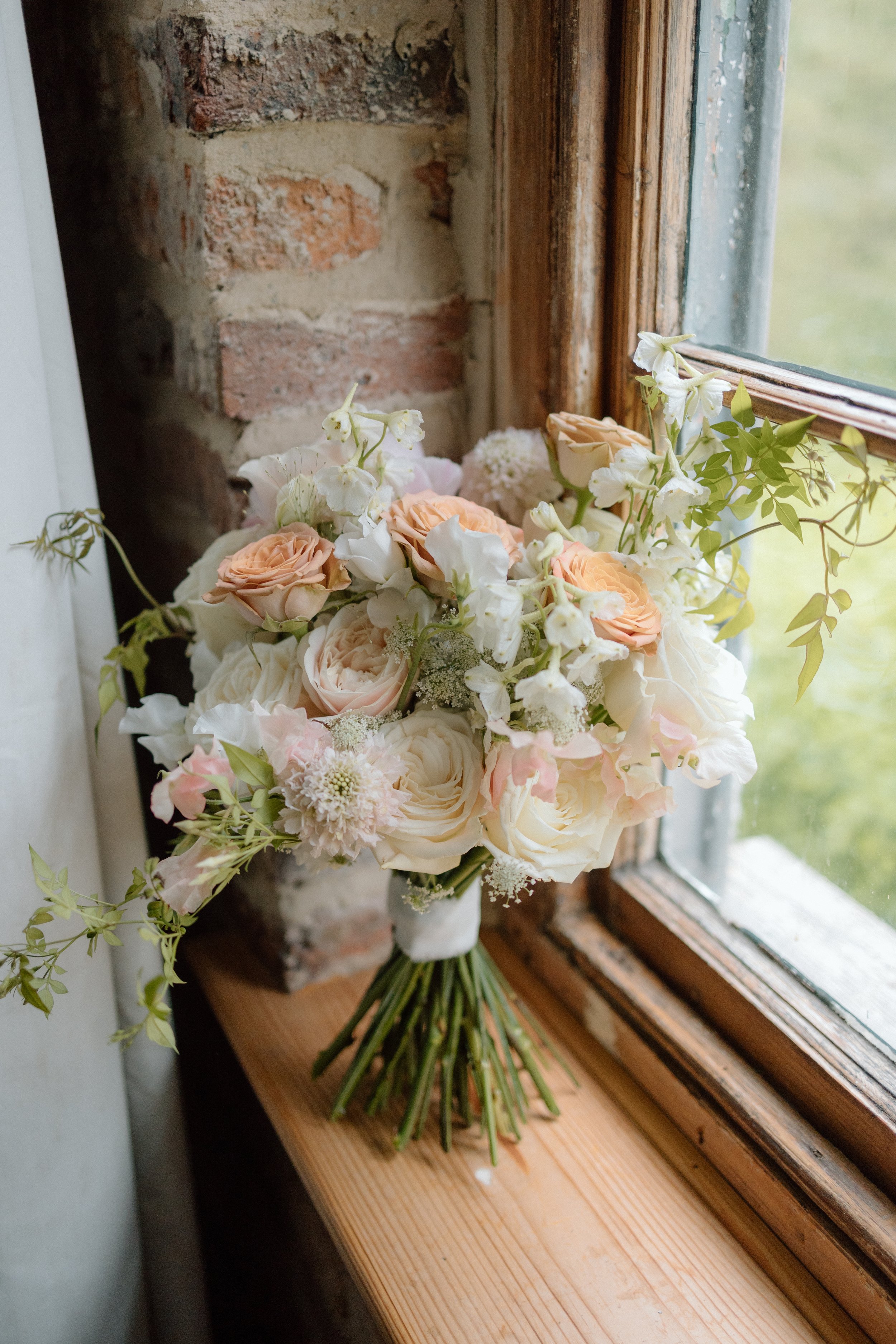 Muted blush and cappuccino full-floral | Image credit: Rach Fraser Photography