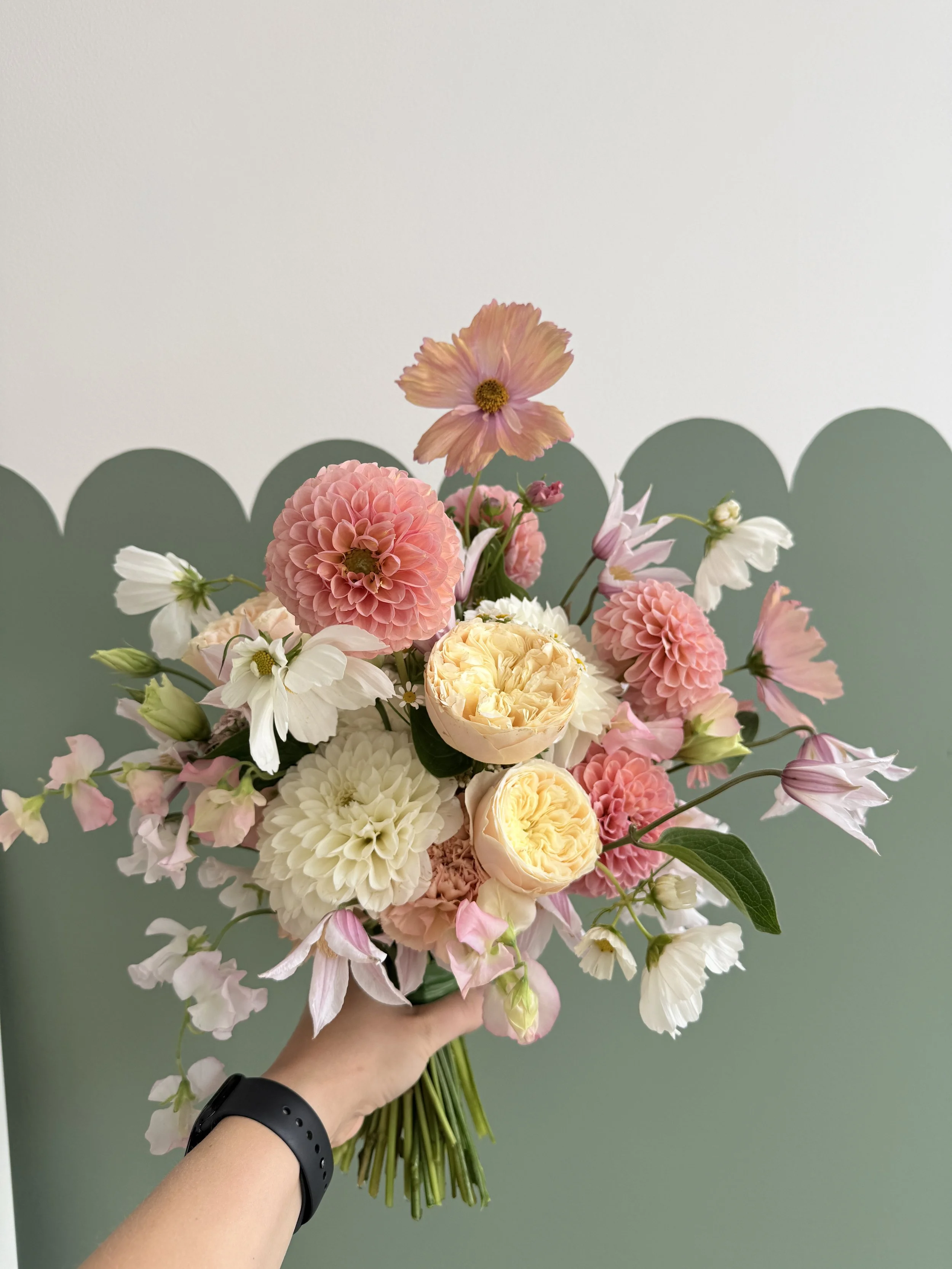 Peachy, apricot and butter yellow Summer bouquet with Dahlias, Emma Woodhouse Roses, Sweet Peas and Apricot Cosmos