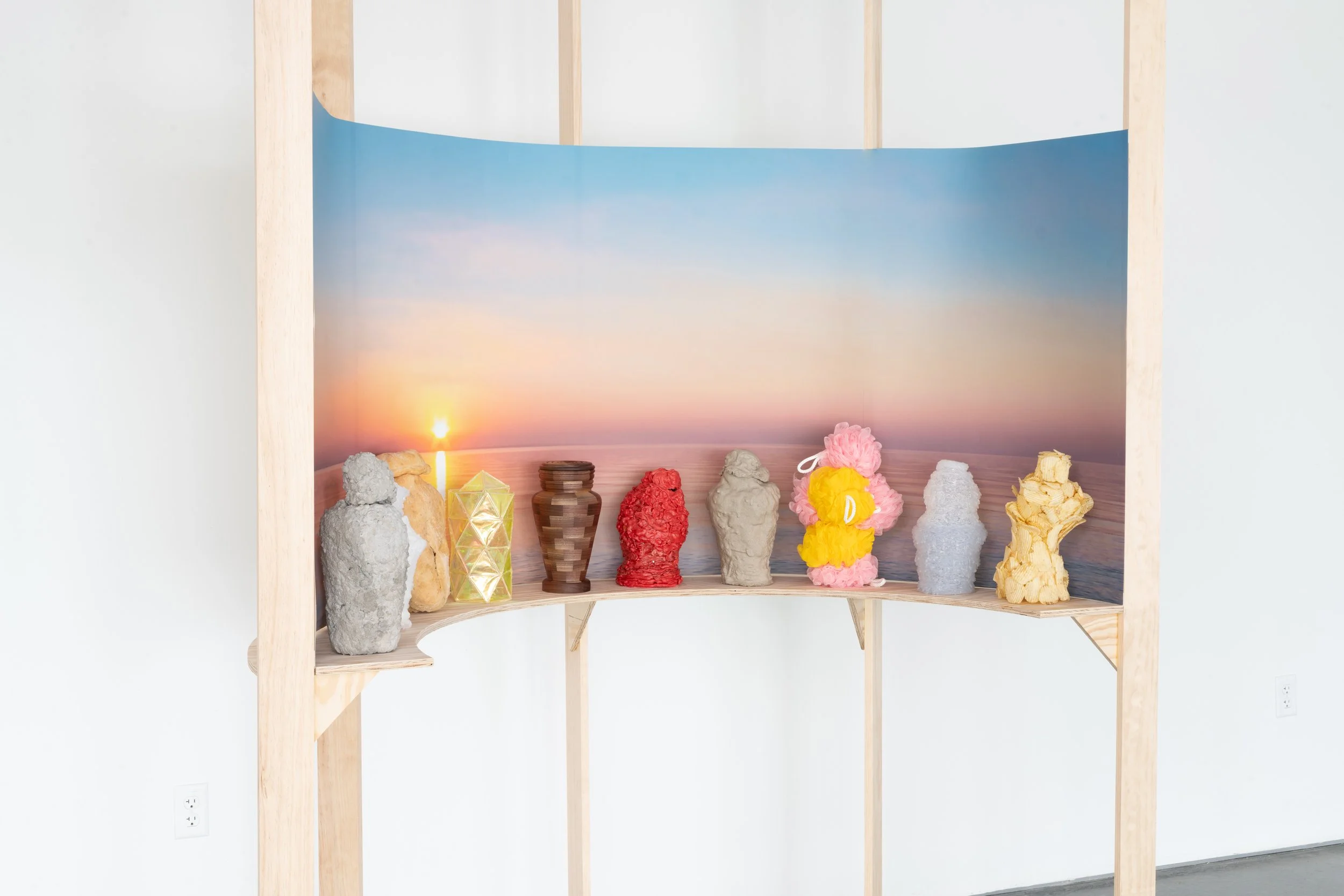 Material Studies in Grief, 
Sanded Ply, Archival Inkjet Print, Concrete, Sugar Crystals, Bread, Cellophane/Toothpicks, Walnut, Chewing Gum, Sand, Loofahs, Hot Glue, Wavy Potato Chips, 2025