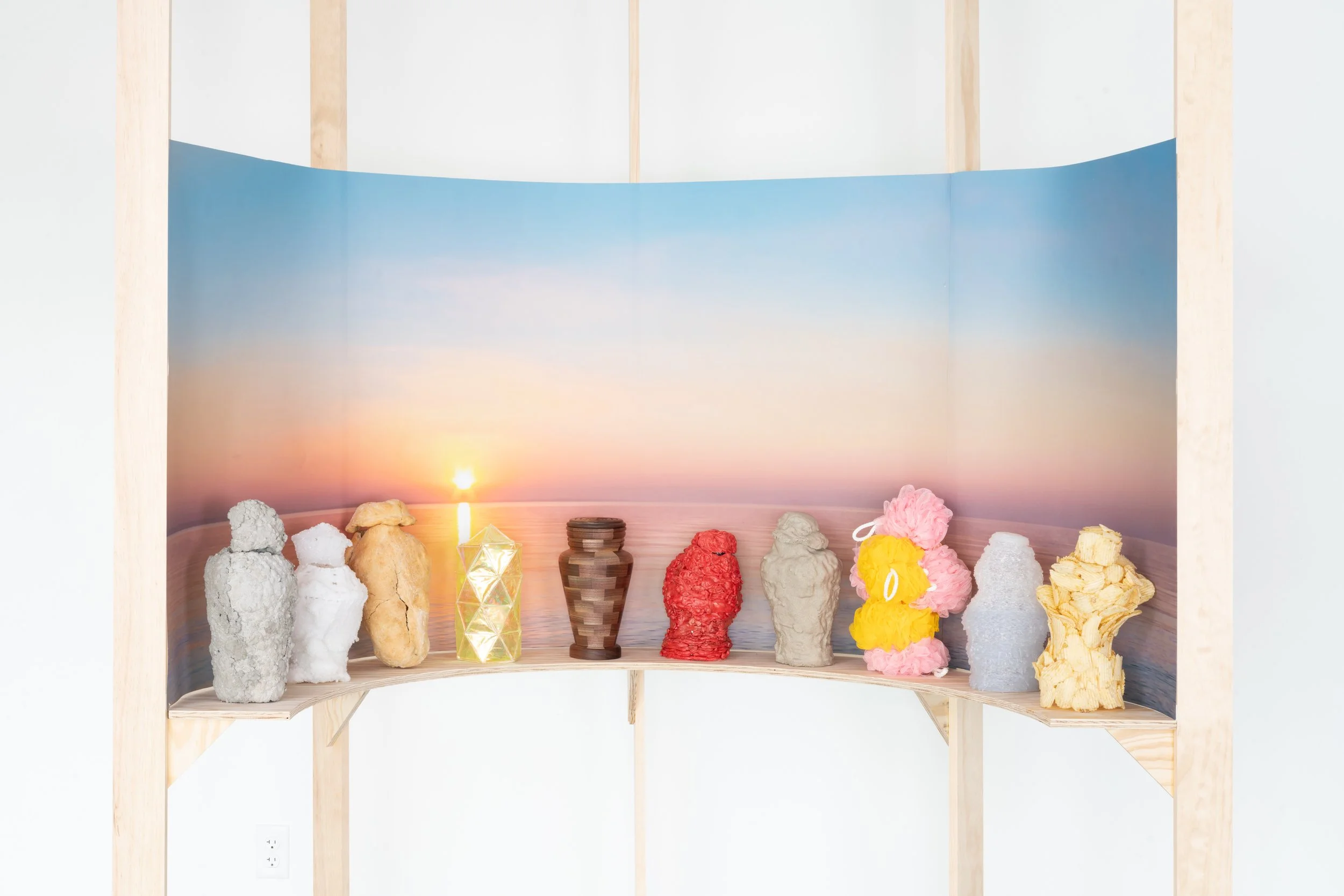 Material Studies in Grief, 
Sanded Ply, Archival Inkjet Print, Concrete, Sugar Crystals, Bread, Cellophane/Toothpicks, Walnut, Chewing Gum, Sand, Loofahs, Hot Glue, Wavy Potato Chips, 2025