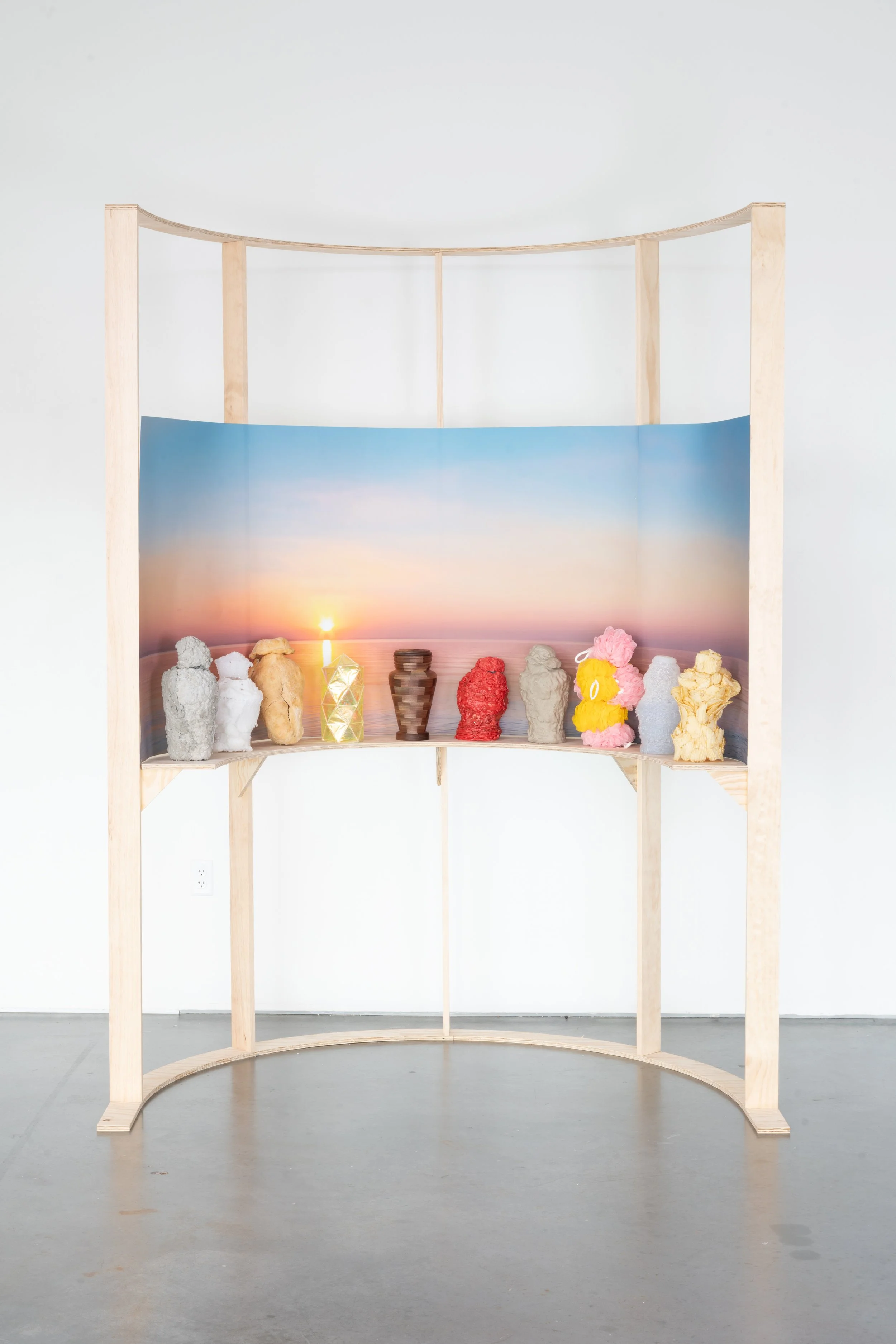 Material Studies in Grief, 
Sanded Ply, Archival Inkjet Print, Concrete, Sugar Crystals, Bread, Cellophane/Toothpicks, Walnut, Chewing Gum, Sand, Loofahs, Hot Glue, Wavy Potato Chips, 2025