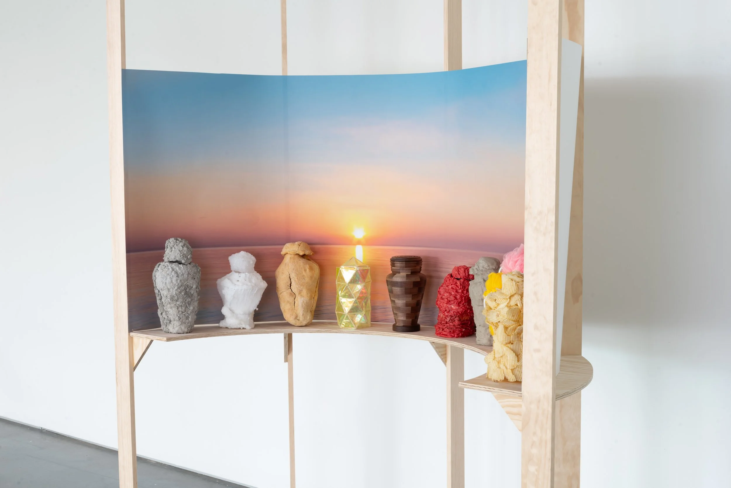 Material Studies in Grief, 
Sanded Ply, Archival Inkjet Print, Concrete, Sugar Crystals, Bread, Cellophane/Toothpicks, Walnut, Chewing Gum, Sand, Loofahs, Hot Glue, Wavy Potato Chips, 2025