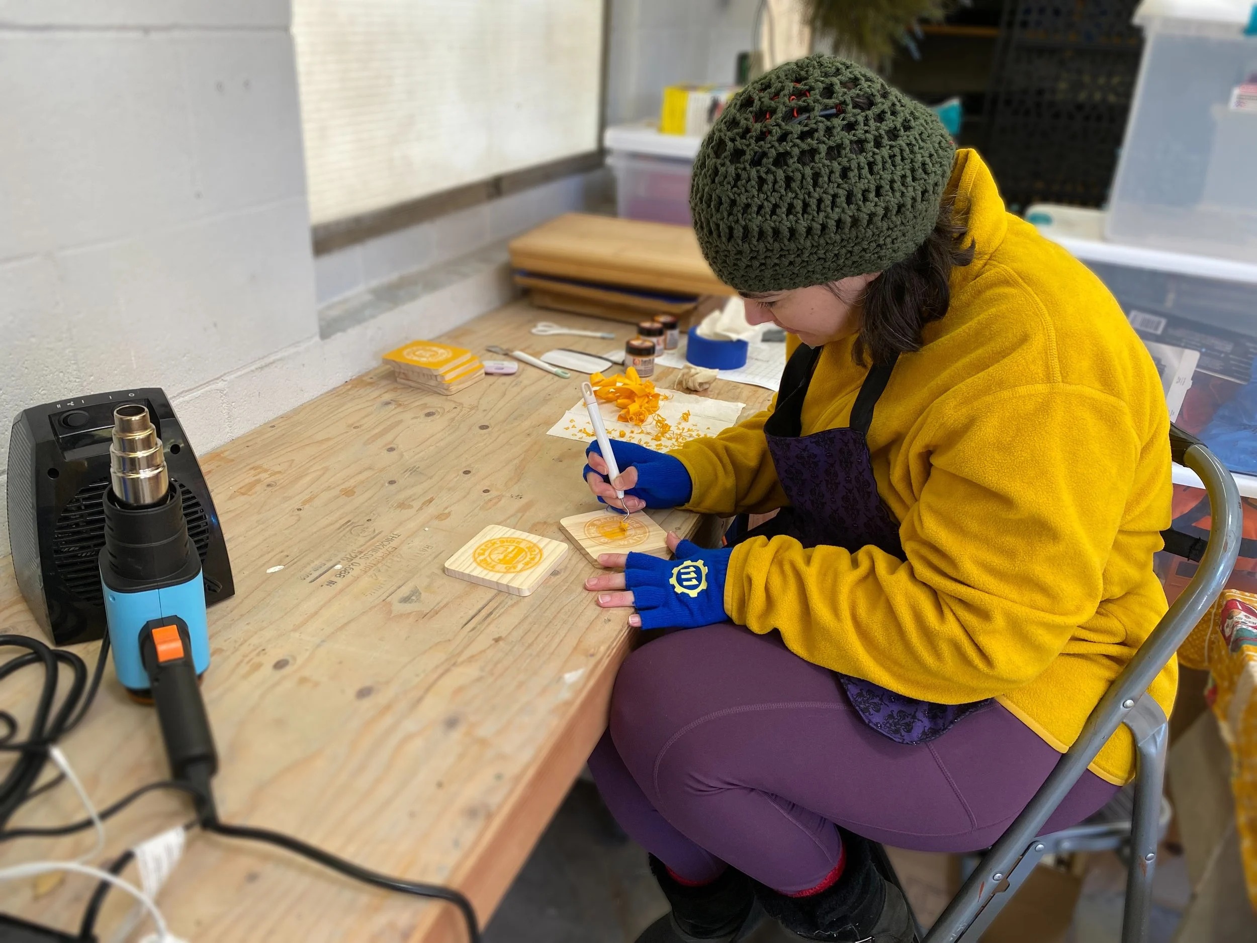 Cheryl prepping for wood-burning