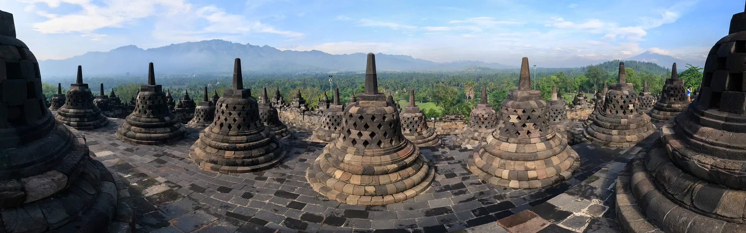 Panoramic view of Borobudur Temple in Central Java, Indonesia, representing ImmerseMe's immersive Indonesian language learning experiences inspired by authentic Indonesian culture and real-world locations.