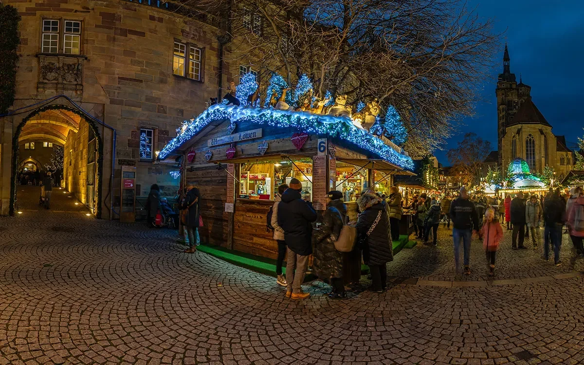 Panoramic evening view of the Stuttgart Christmas Market in Germany, representing ImmerseMe's immersive German language learning experiences inspired by authentic German culture and real-world locations.