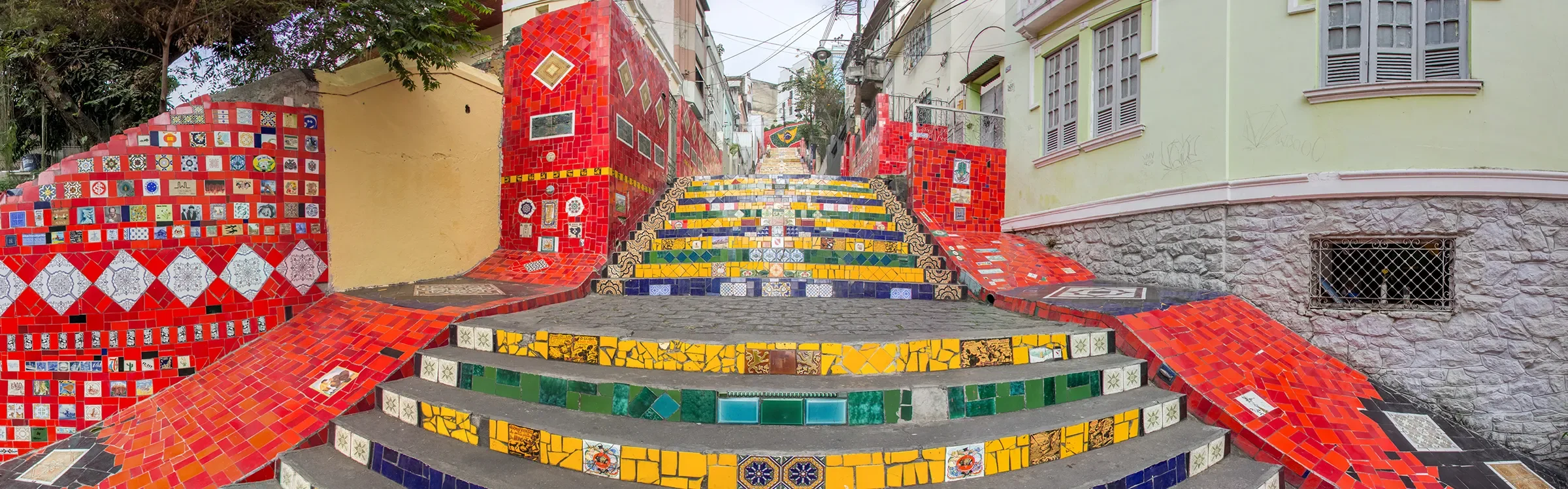 Panoramic view of Escadaria Selarón in Rio de Janeiro, Brazil, representing ImmerseMe's immersive Portuguese language learning experiences inspired by authentic Brazilian culture and real-world locations.