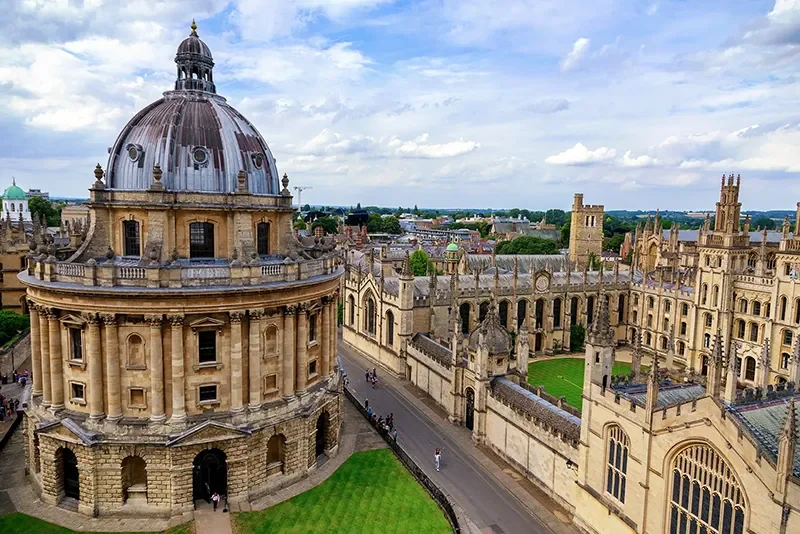 The University of Oxford campus featuring the Radcliffe Camera, representing research into ImmerseMe and language learning.
