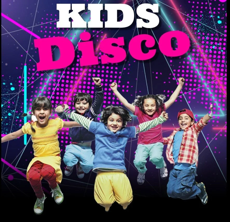 Children dancing and jumping in front of a vibrant background with the text 'Kids Disco' in large colorful letters.