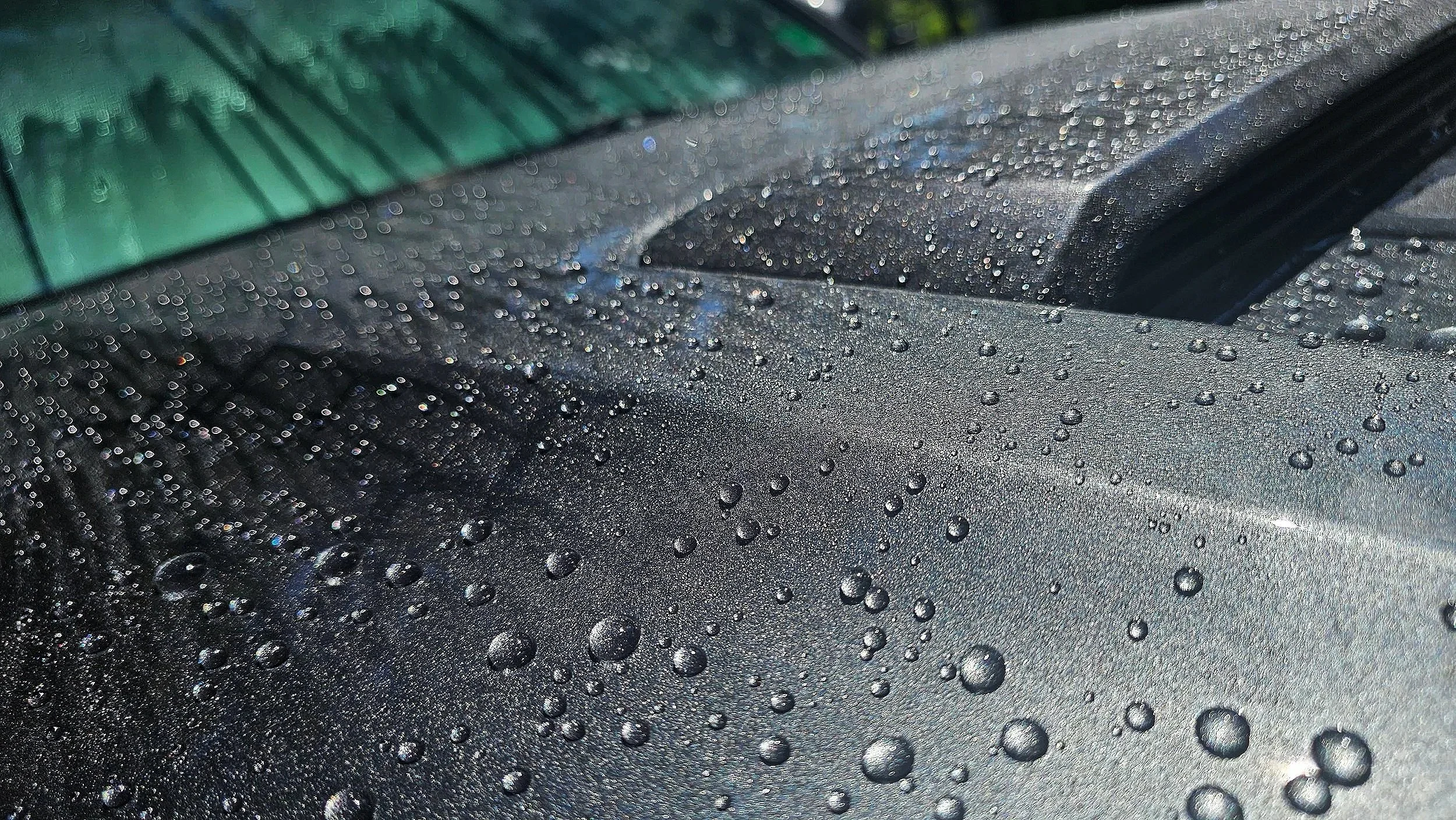 A detailed and ceramic coated truck in Poquoson which is protected and has water bedding over the top to keep it clean