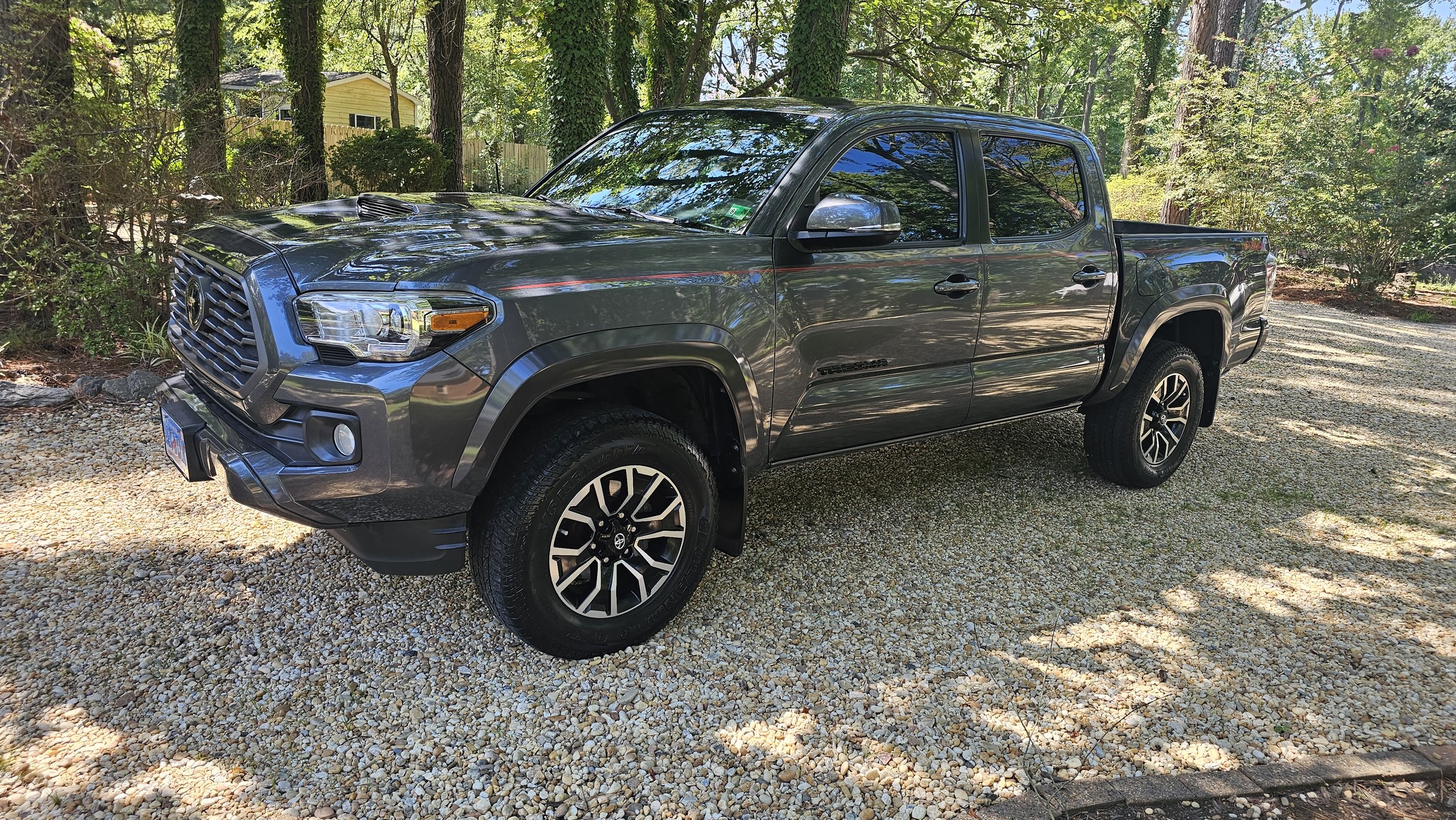 Toyota Tacoma Pickup Truck that is very shiny, clean, detailed, after being paint corrected, with a ceramic coating in Poquoson Virginia