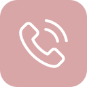 Icon of a white phone handset on a pink circular background