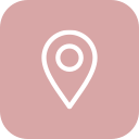Icon of a map pin on a pink background