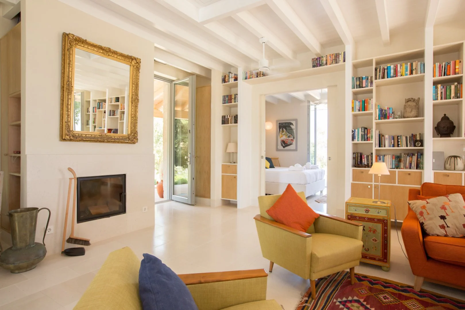 12_Villa Velanidi_fireplace_bookshelf.jpg