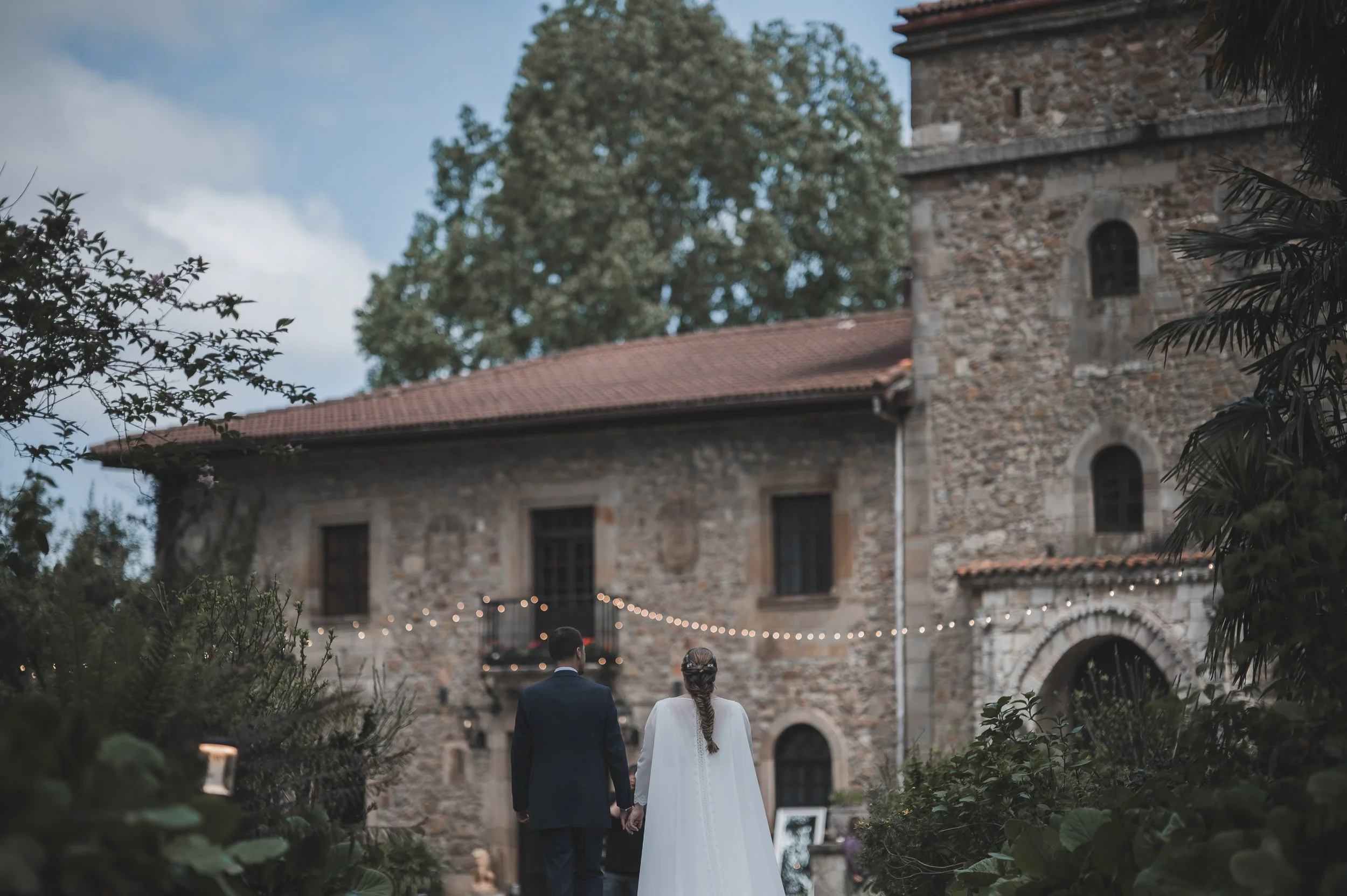 Historic stone palace courtyard set up for an intimate destination wedding.