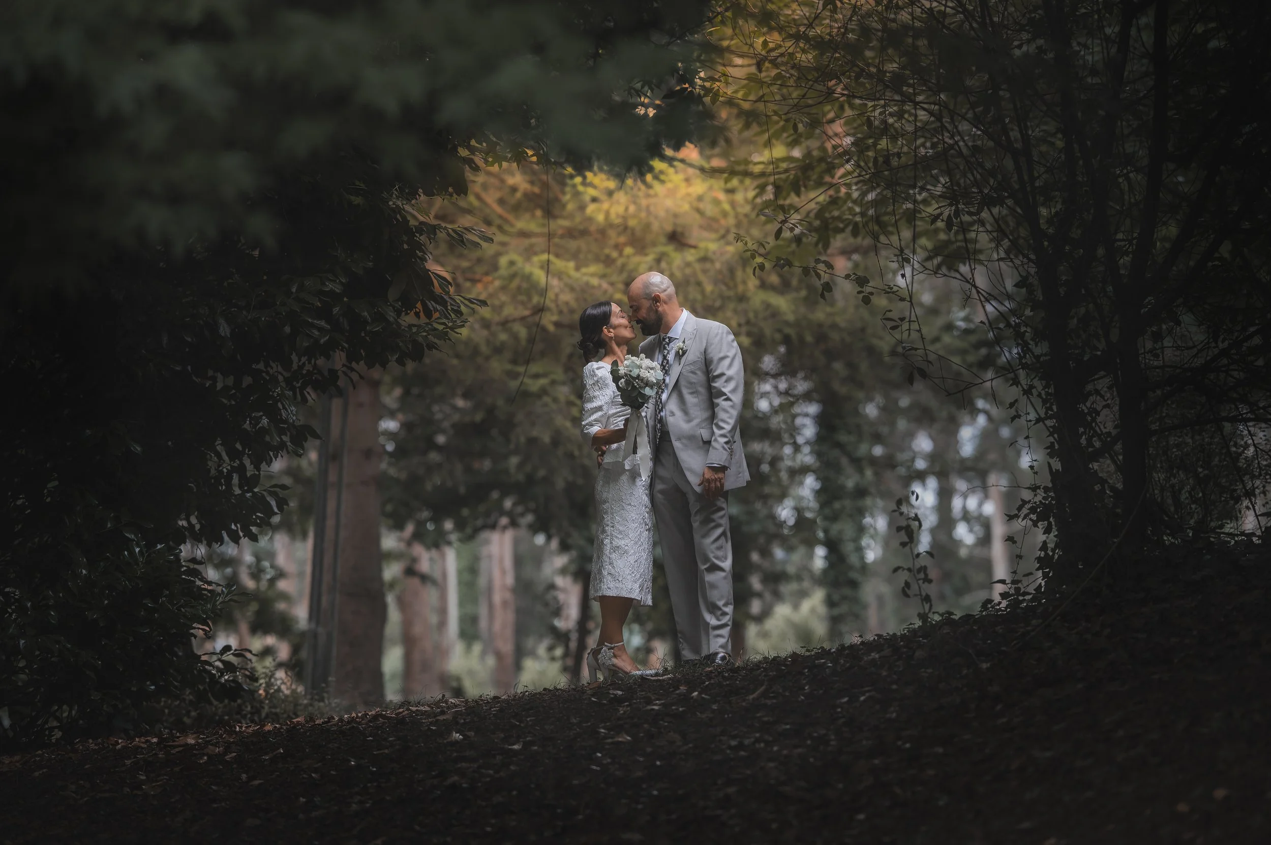 Emotional outdoor destination wedding ceremony in Europe captured in candid style.