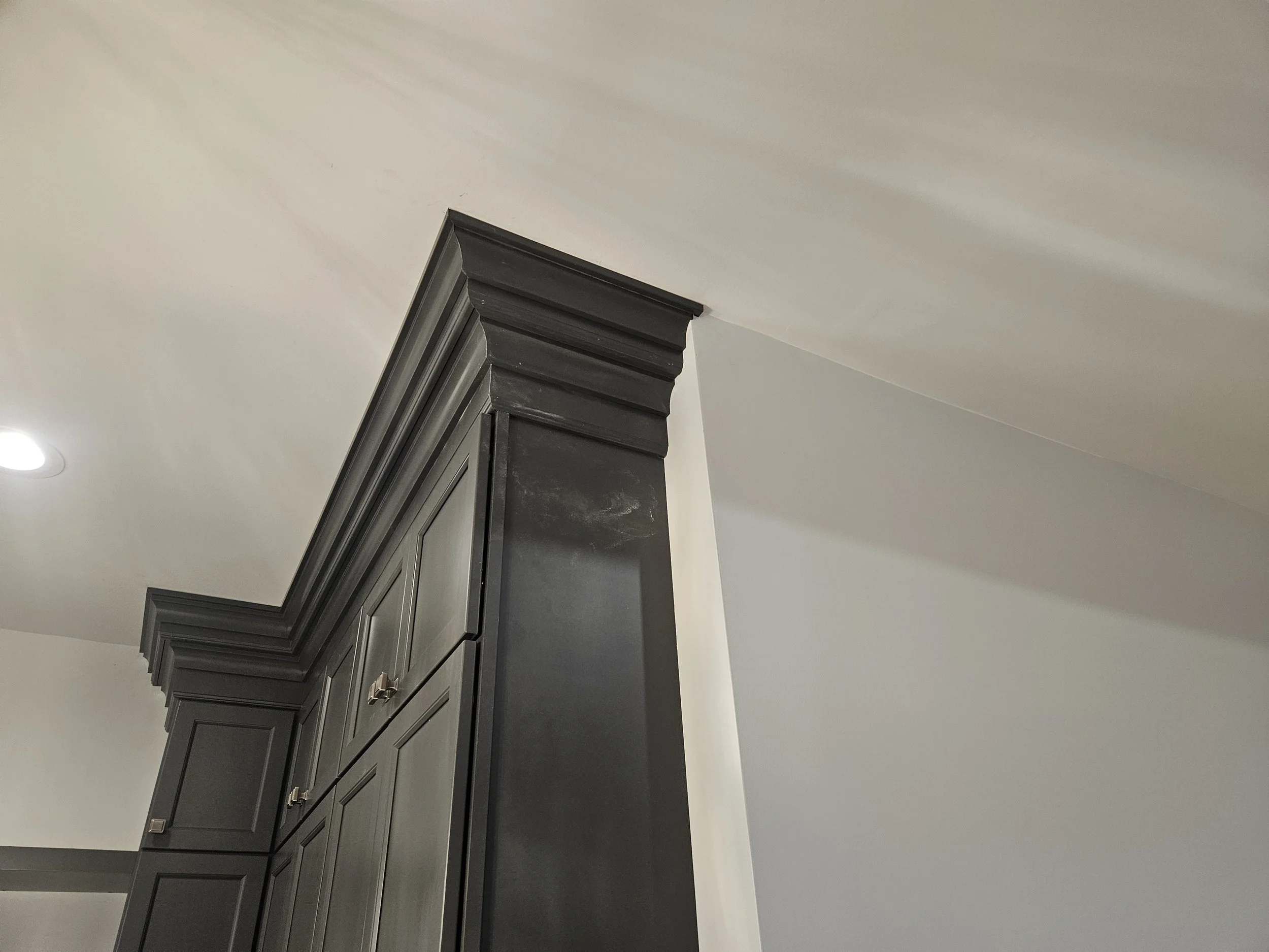 Here we installed cabinets and 4 piece crown molding