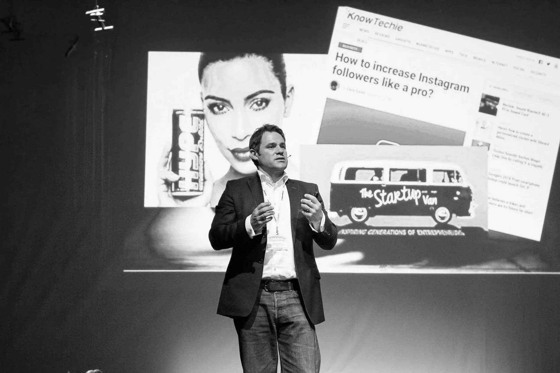Michael speaking on stage at Conventa