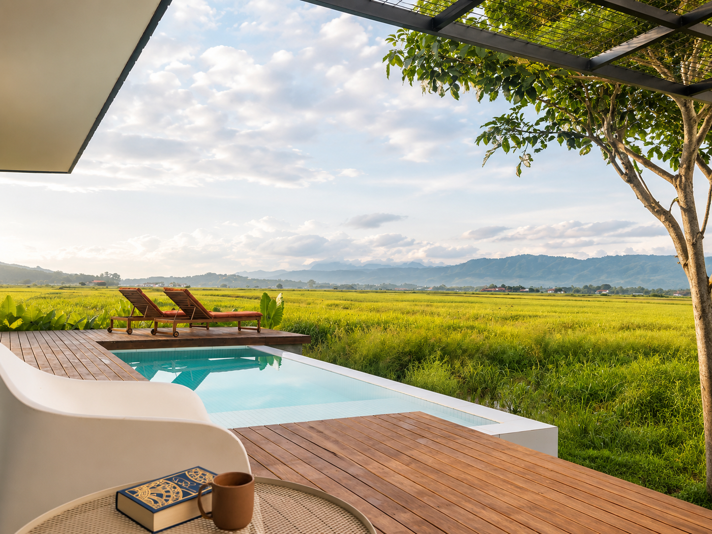 Morning coffee by the pool — rice fields stretching to the horizon