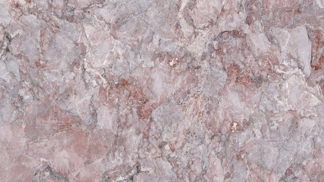 Close-up of a pink and gray marble stone surface.