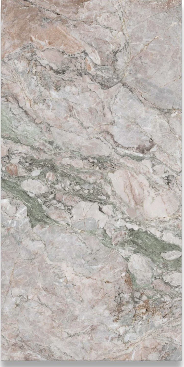Close-up of a marble surface with light pink, white, green, and gray veins and patterns.