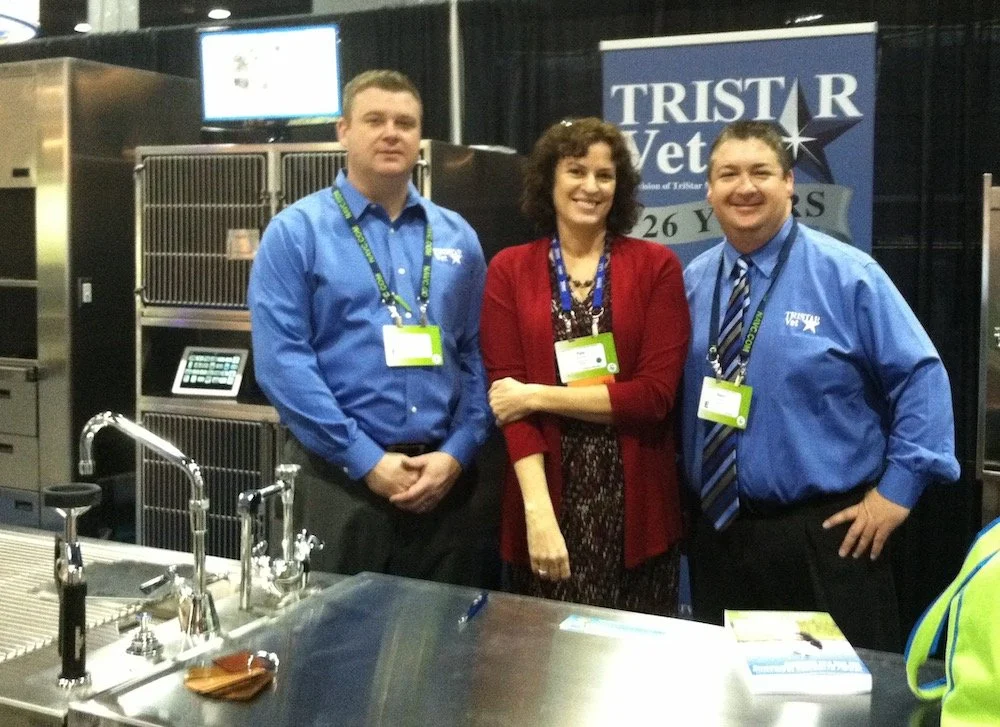 Pam Foster with trade show clients TriStar Vet